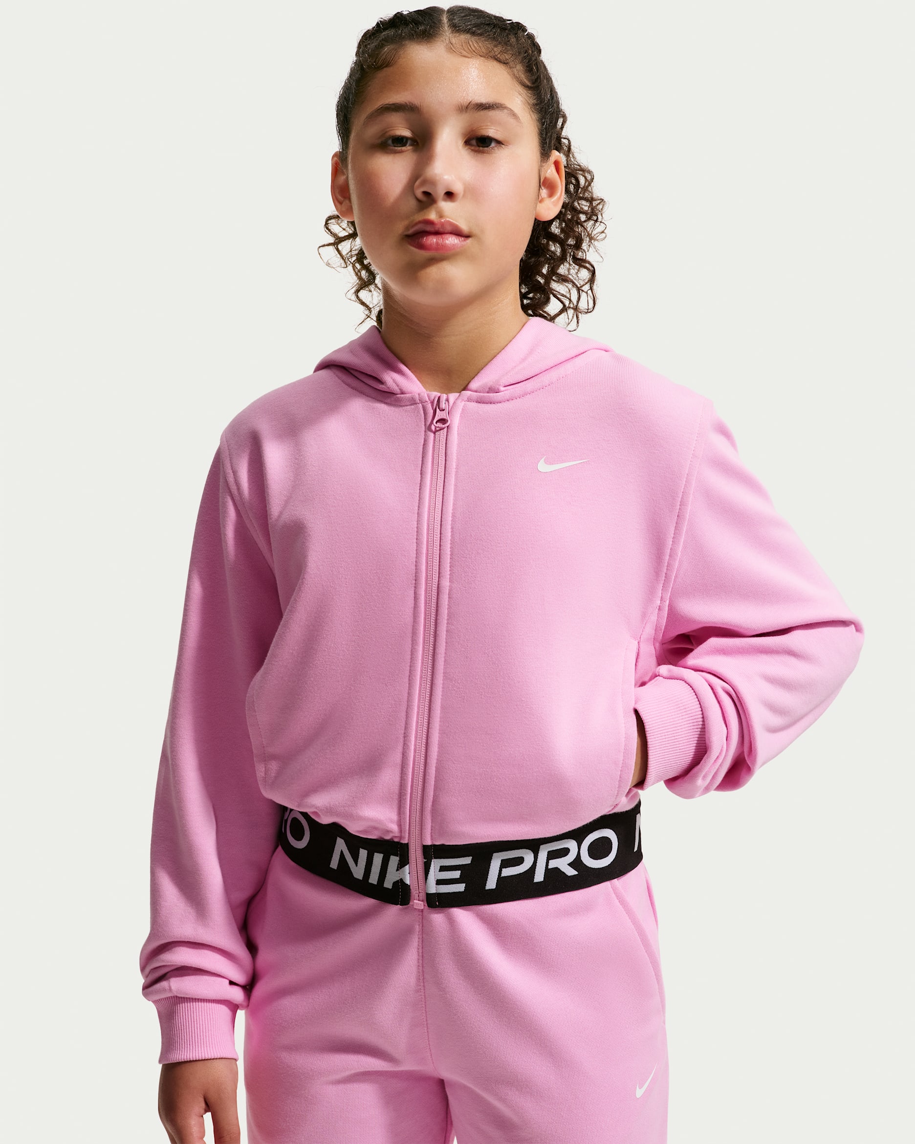 Nike Pro Fleece Dri-FIT-hættetrøje med fuld lynlås til større børn (piger) - Pink Rise/Pink Rise/sort/hvid