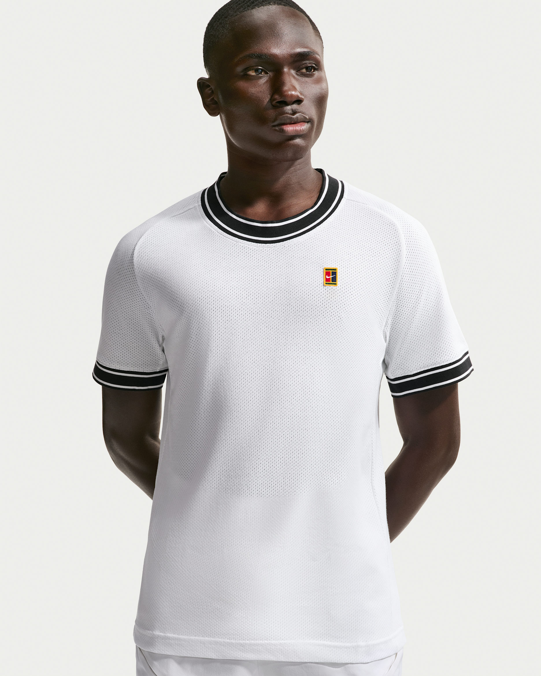 NikeCourt Heritage Kurzarm-Tennisoberteil für Herren - Weiß/Schwarz