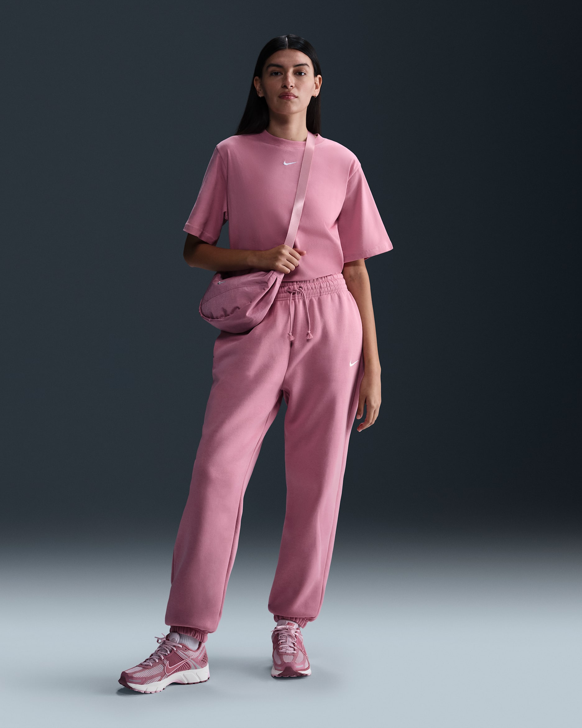 Pants de entrenamiento oversized de tiro alto para mujer Nike Sportswear Phoenix Fleece - Rosa elemental/Vela