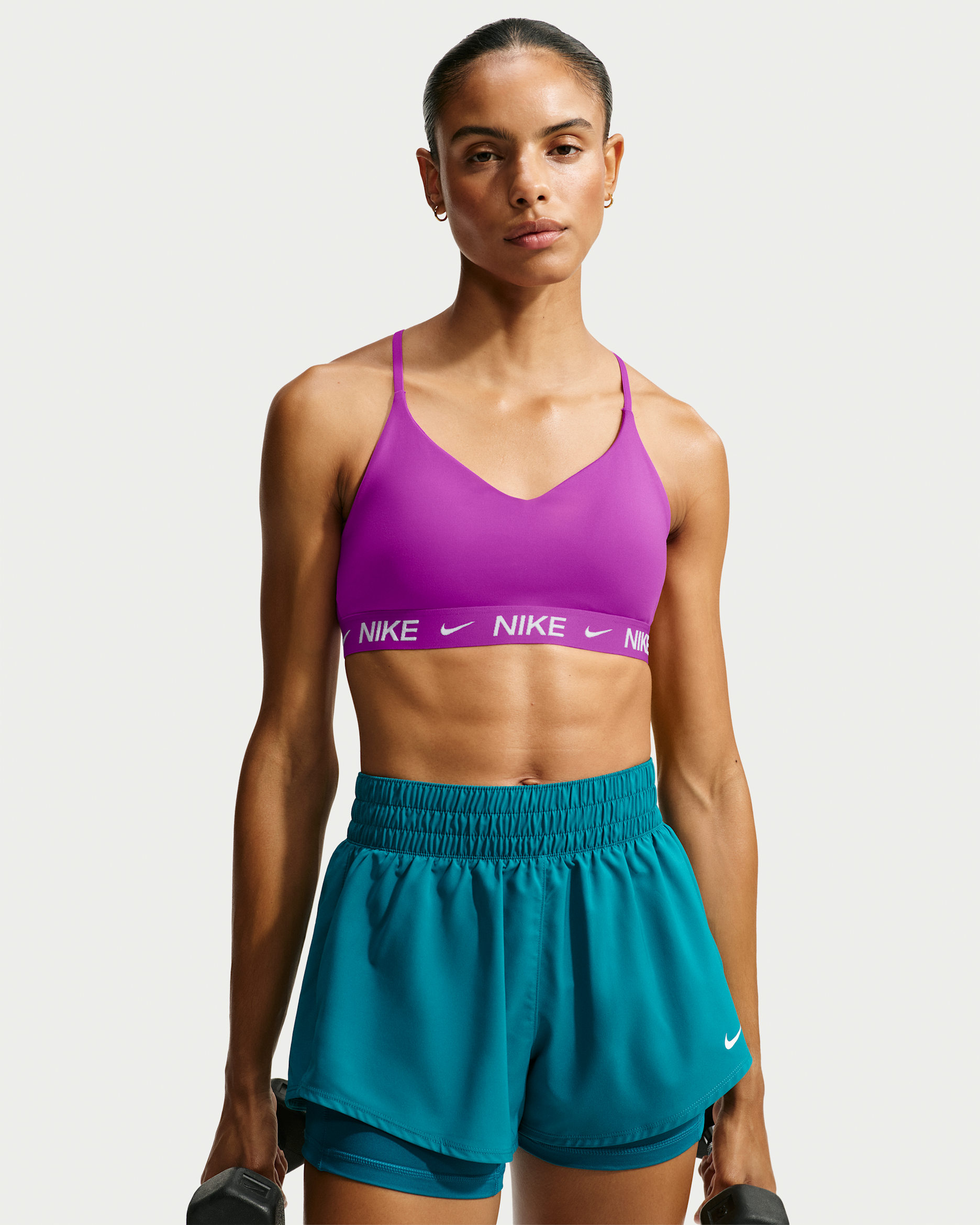 Damski regulowany stanik sportowy z wkładkami Nike Indy Light Support - Vivid Purple