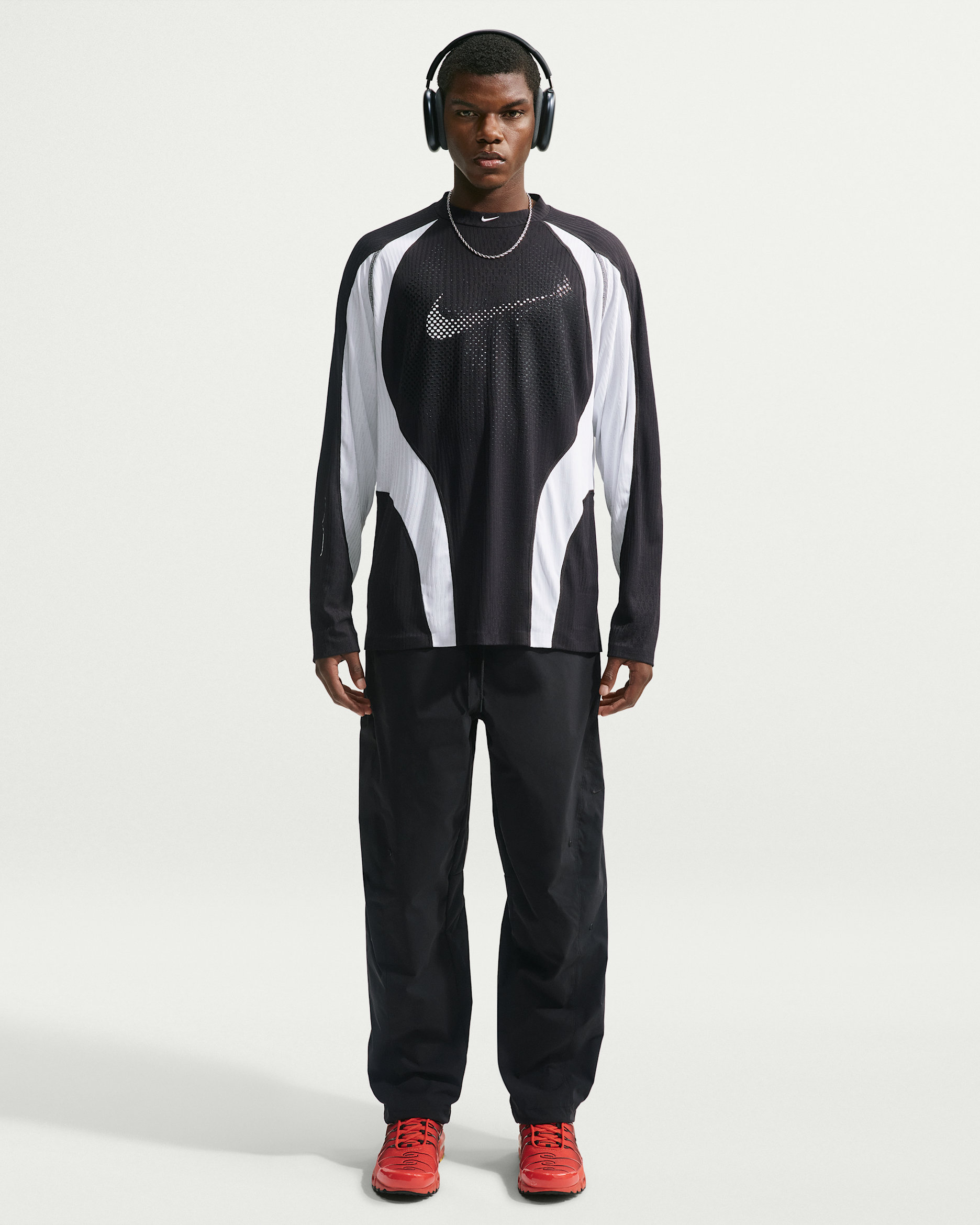 Pantaloni Dri-FIT con orlo aperto Nike Tech Helios – Uomo - Nero/Nero