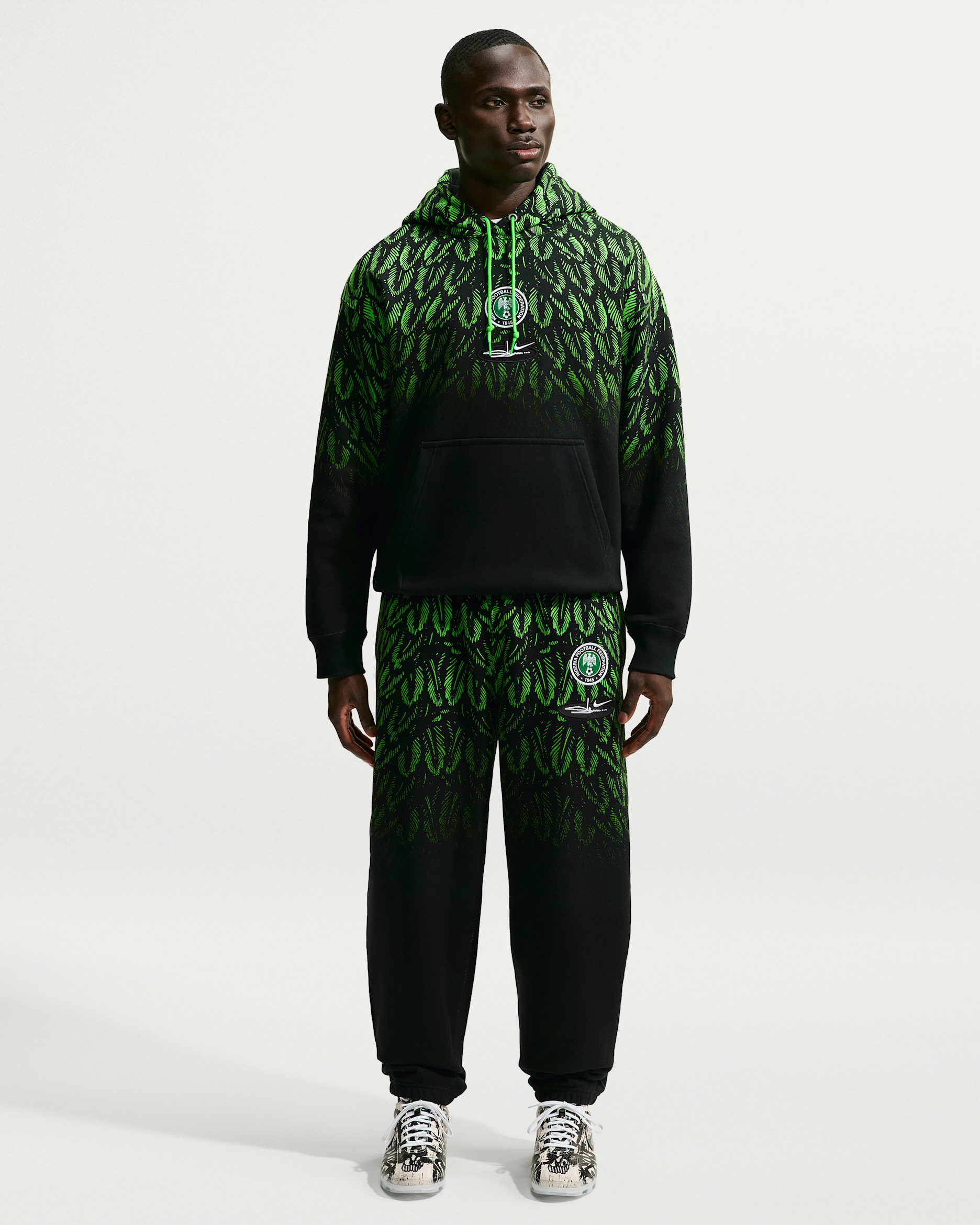 Pantalon en tissu Fleece Nike x Nigeria x Slawn pour homme - Noir/Poison Green/Blanc