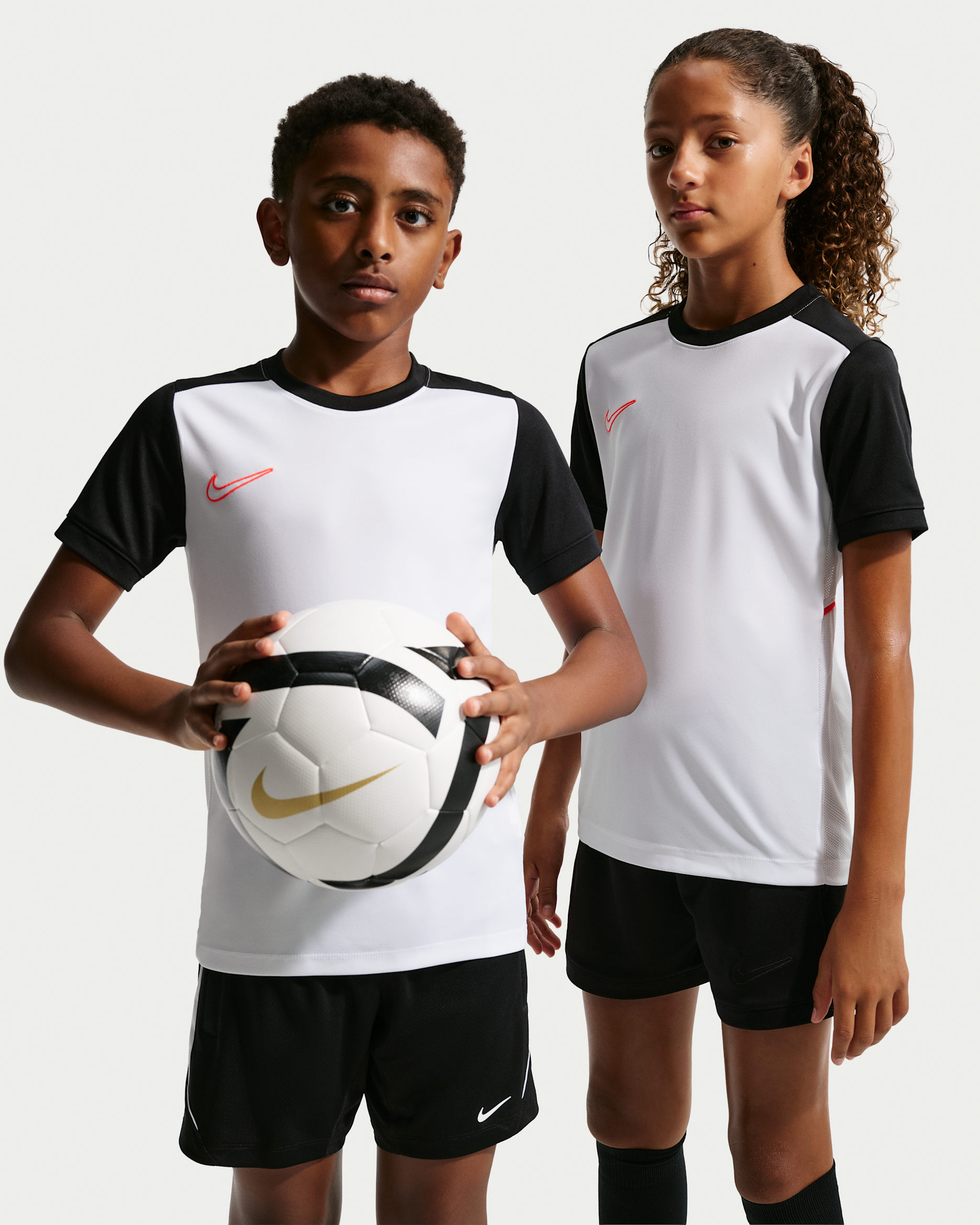 Nike Academy Older Kids' Dri-FIT Football Top - White/Black/Bright Crimson/Bright Crimson