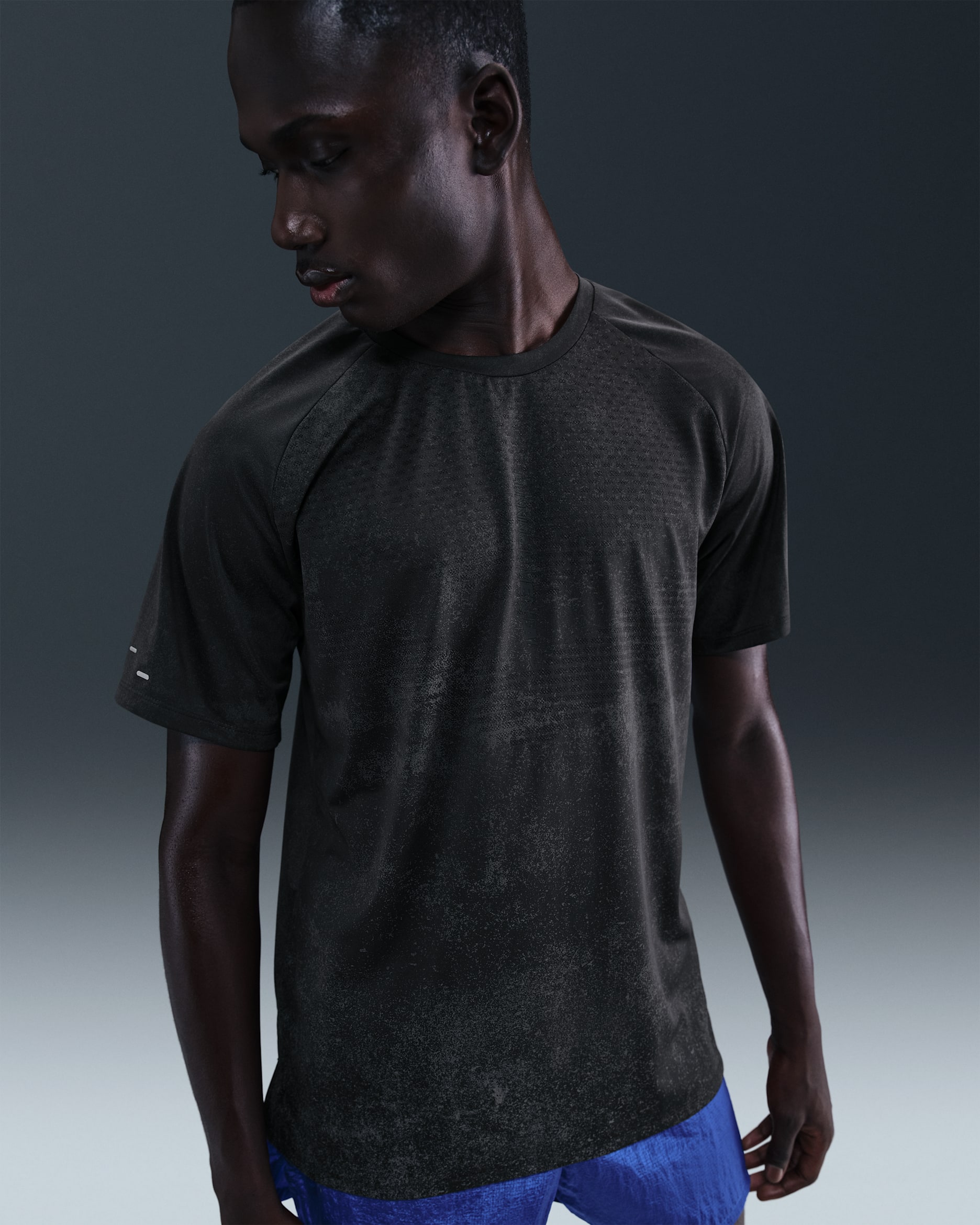 Nike Stride Men's Dri-FIT ADV Short-Sleeve Running Top with Reflective Design Accents - Off-Noir