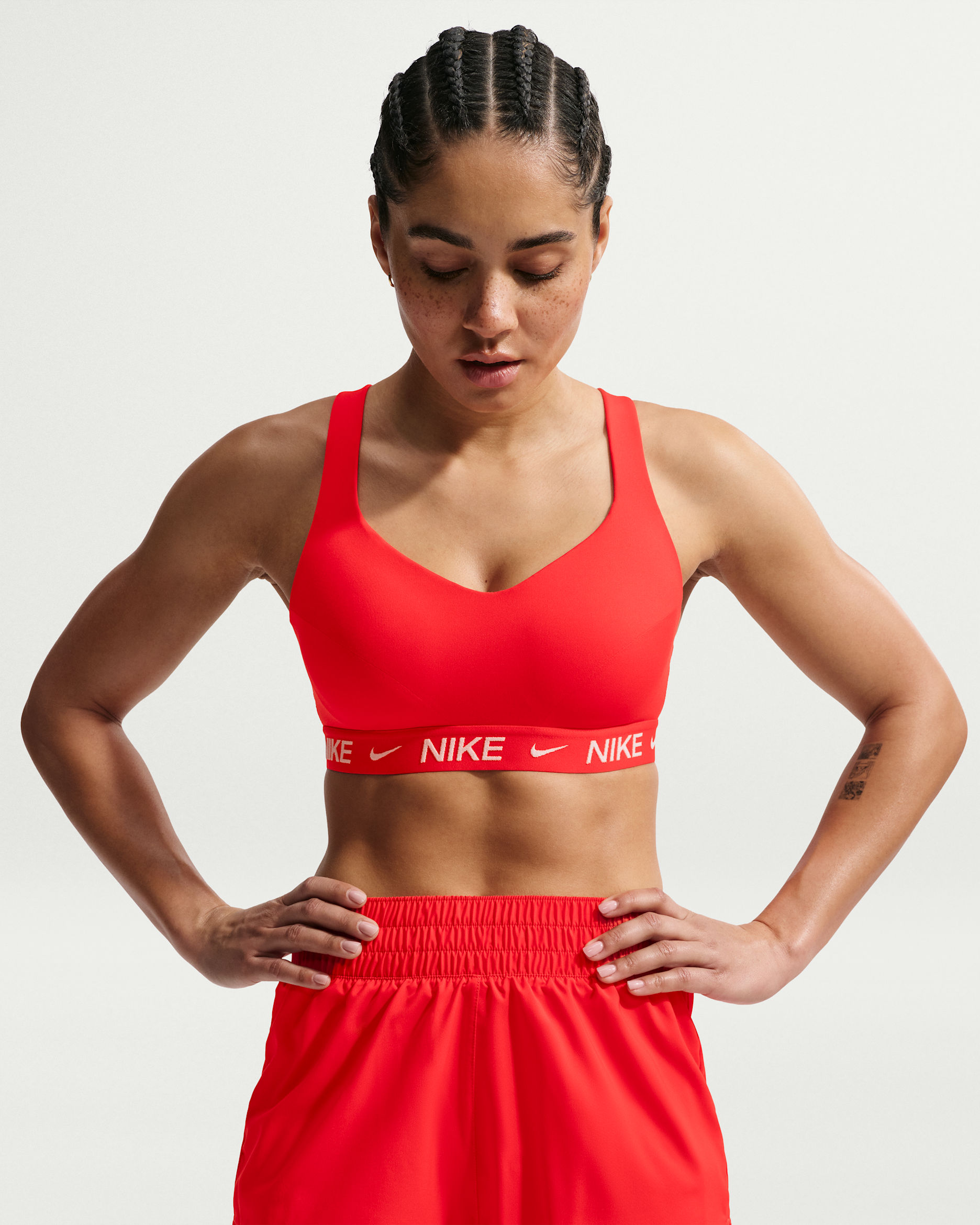 Nike Indy High Support Women's Padded Adjustable Sports Bra - Light Crimson