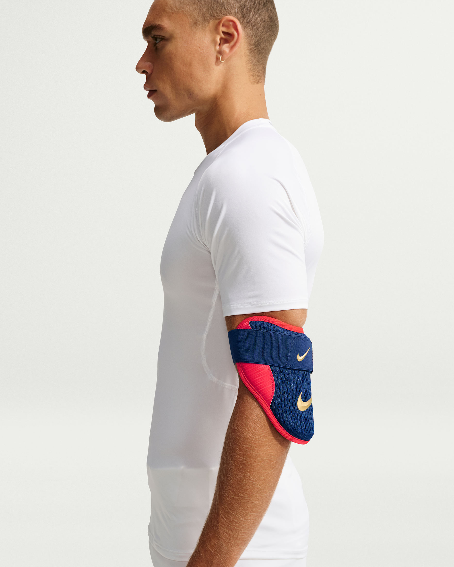 Protector para codo para bateador de béisbol Nike Diamond - Azul vacío/Pimiento/Oro metalizado