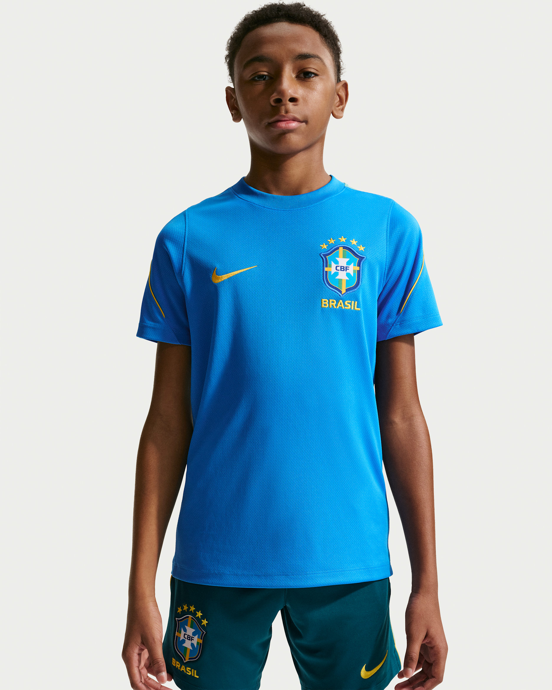 Brazil Strike Big Kids' Nike Soccer Dri-FIT Short-Sleeve Top - Light Photo Blue/Light Menta/Midwest Gold