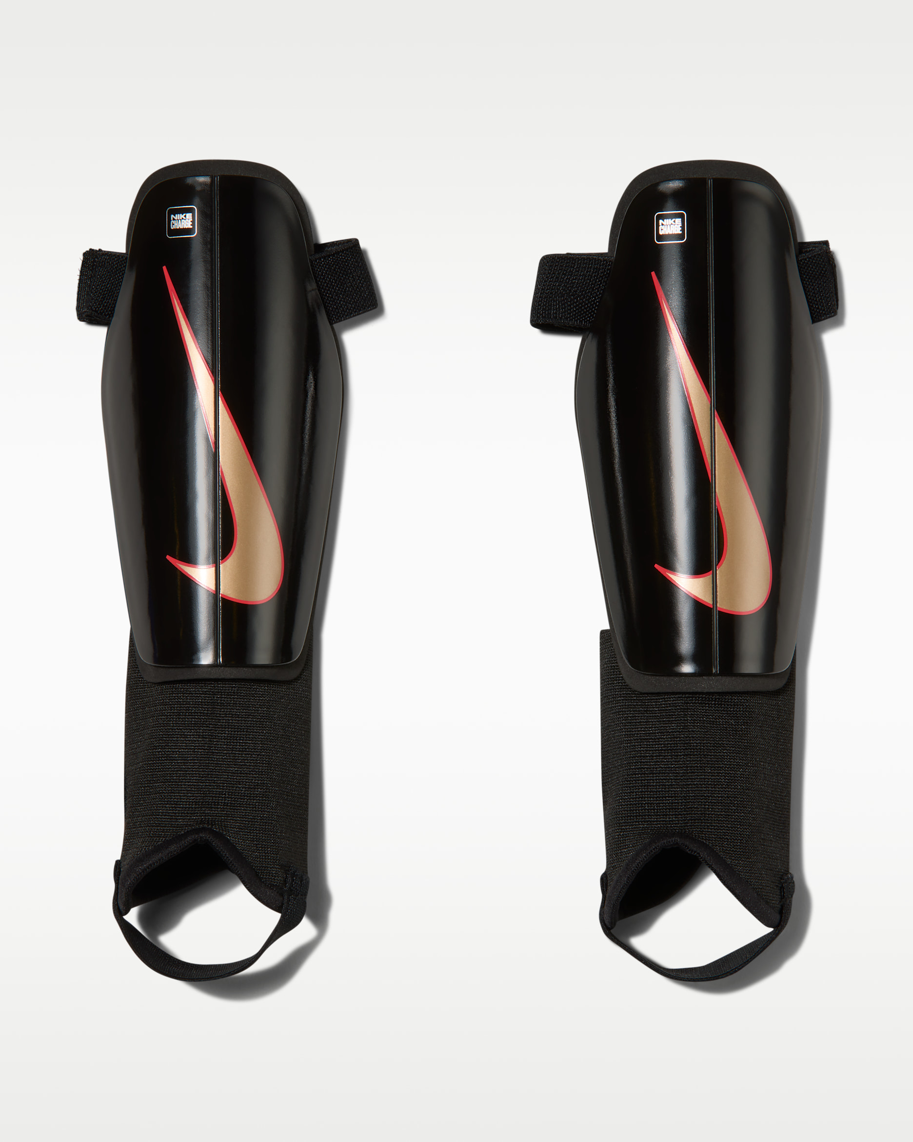 Espinilleras de fútbol para niños Nike Charge - Negro/Carmesí brillante/Difuso
