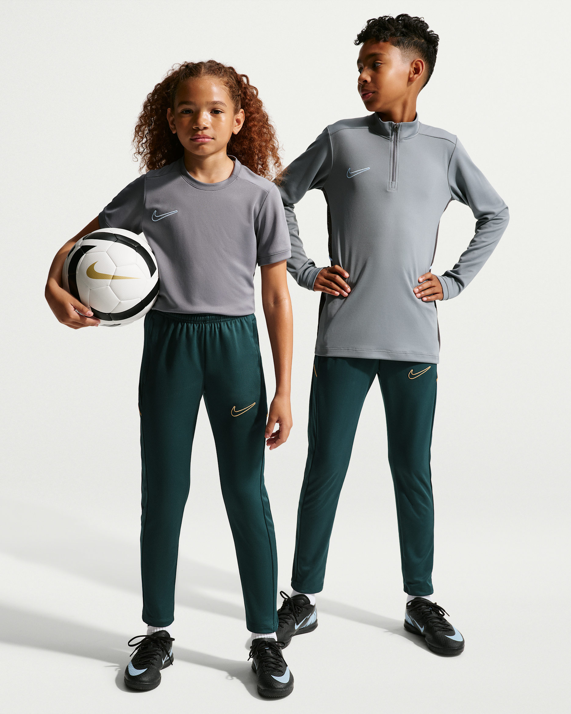 Nike Academy Older Kids' Dri-FIT Football Pants - Midnight Spruce/Midnight Spruce/Elemental Gold/Metallic Gold