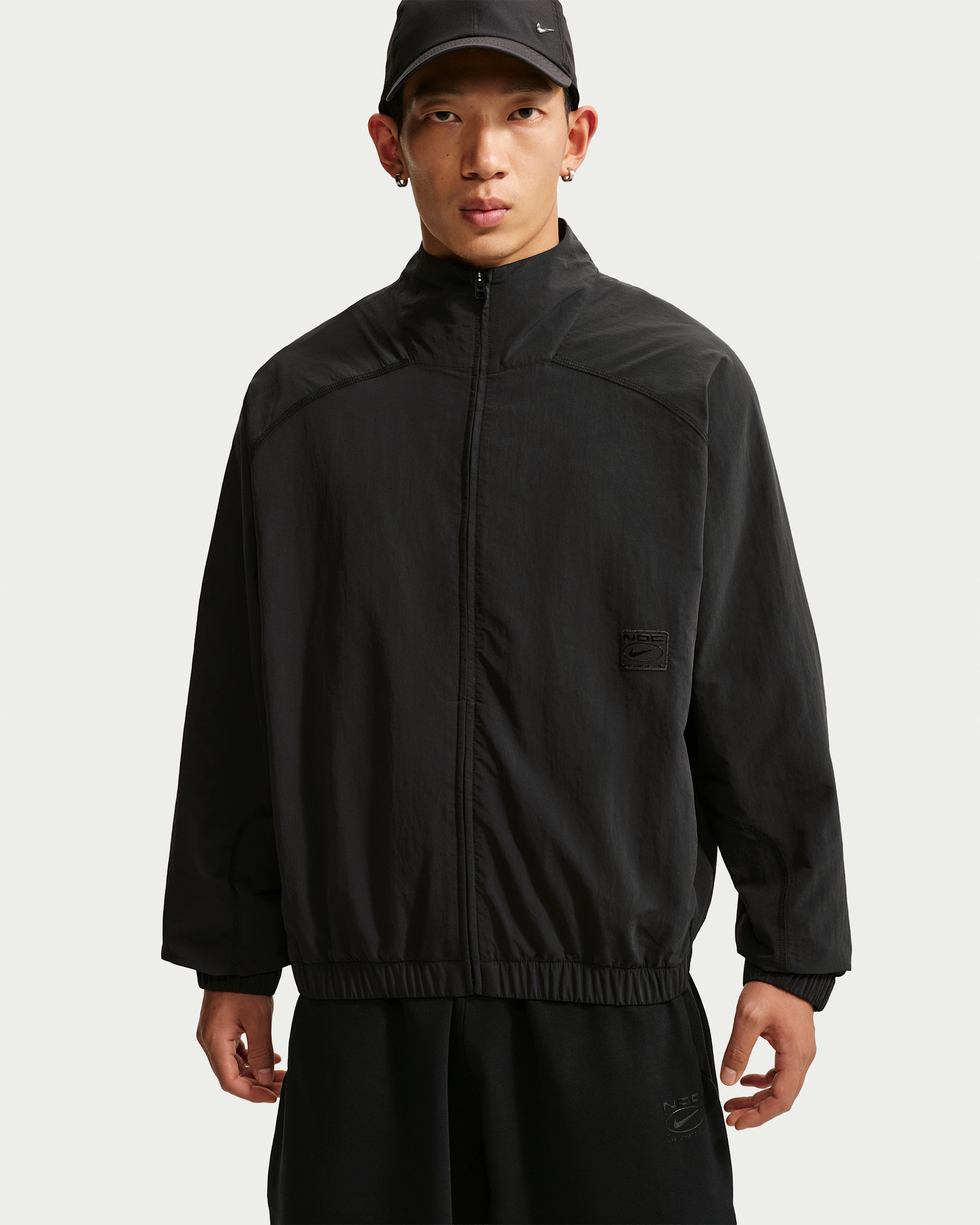 เสื้อแจ็คเก็ตแบบทอซิปยาวขนาดโอเวอร์ไซส์ผู้ชาย Dri-FIT N.A.C. Nike - ดำ/ดำ