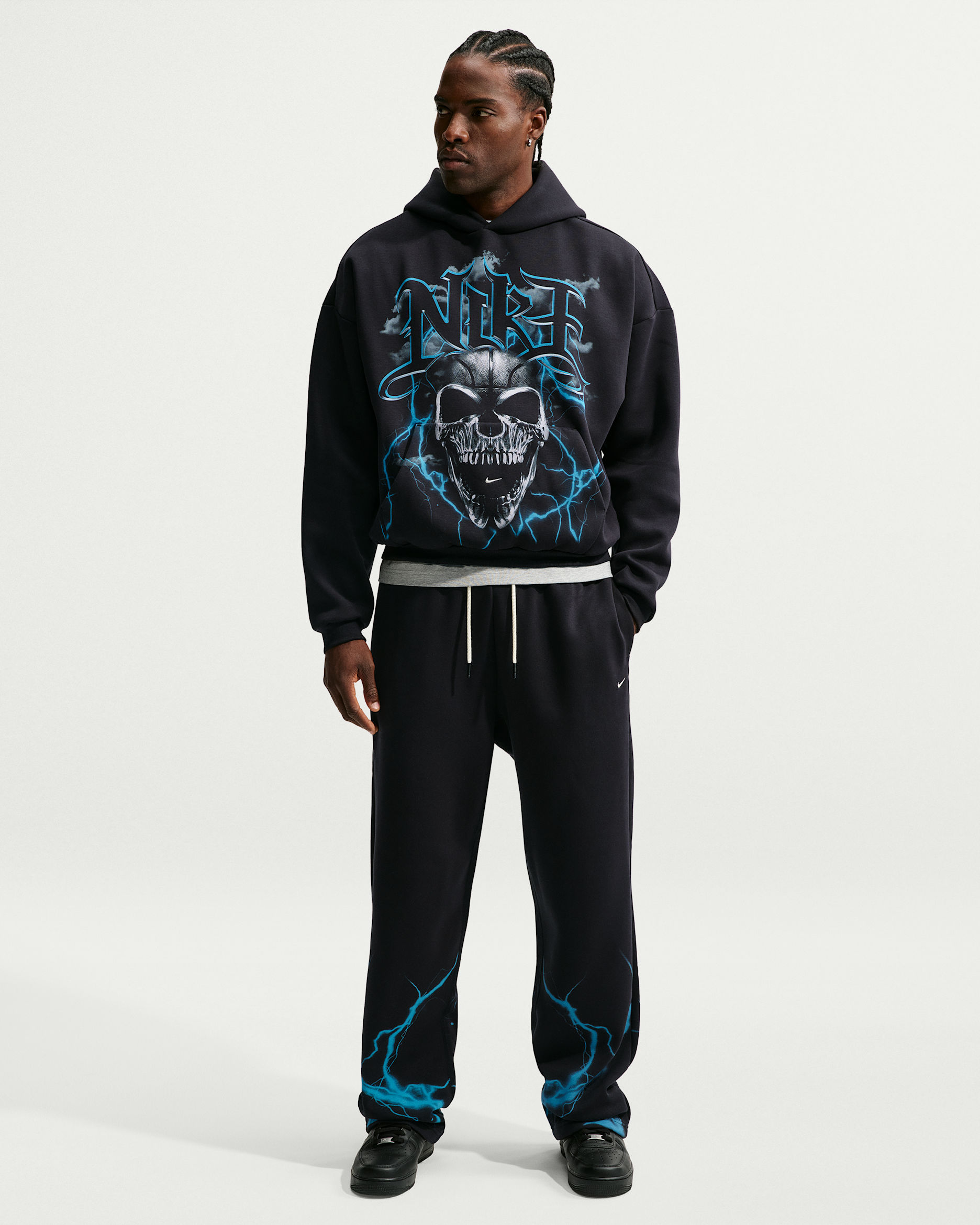 Børstede Nike Standard Issue-basketballbukser til mænd - sort/Light Current Blue/Pale Ivory
