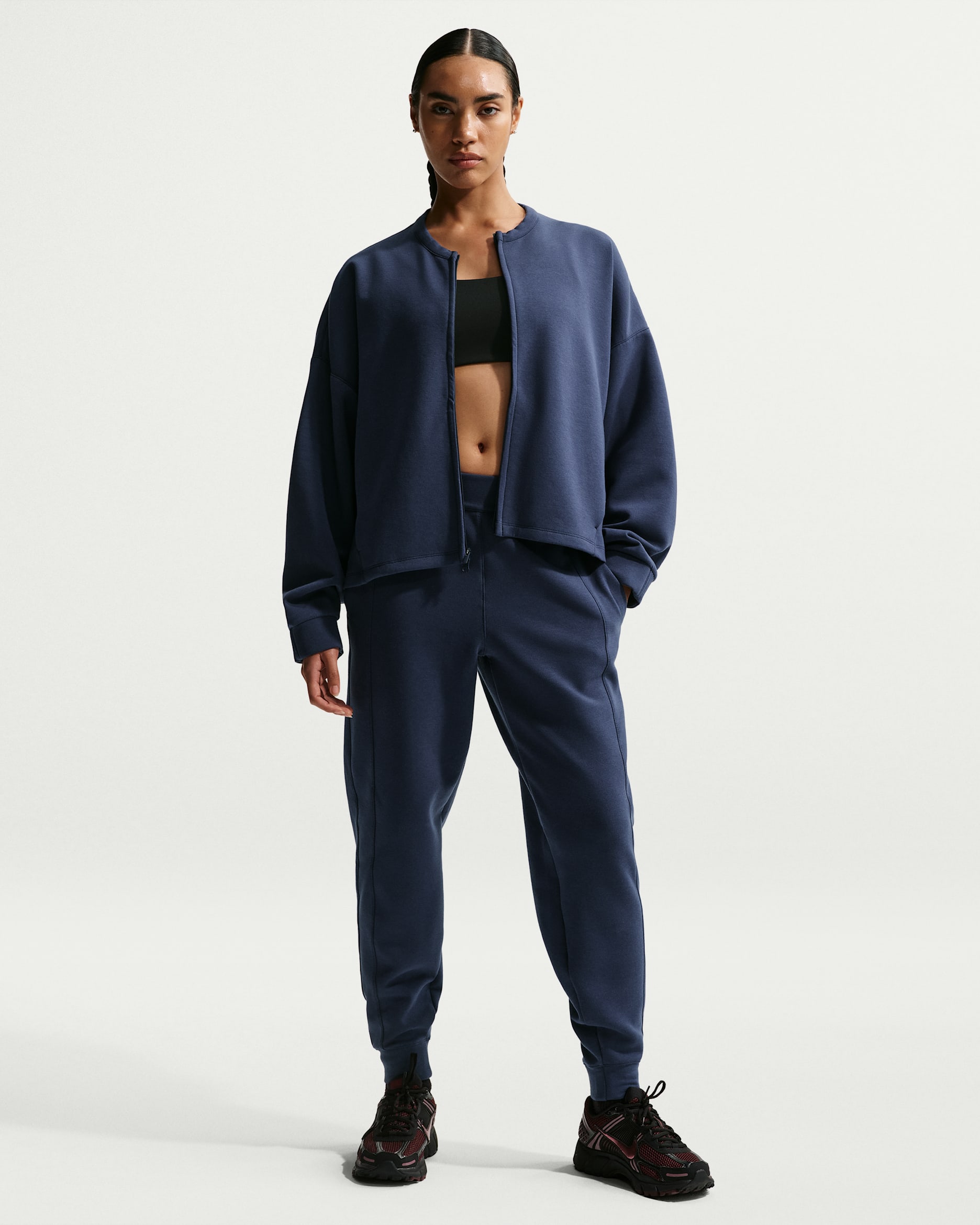 Joggers Dri-FIT de tiro medio para mujer Nike 24.7 ImpossiblySoft - Azul marino medianoche/Obsidiana oscuro