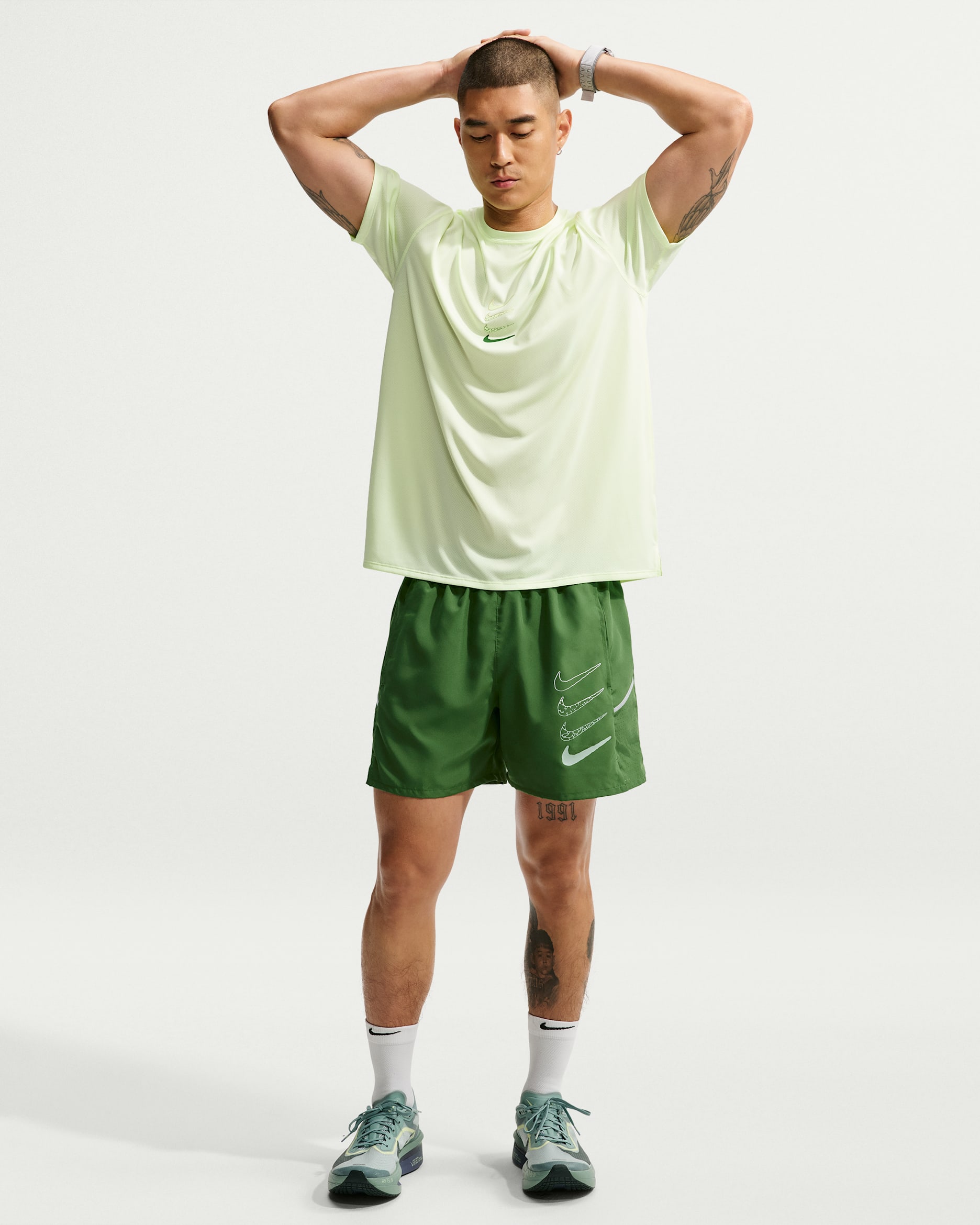 Nike Miler Dri-FIT Laufshorts mit Futter (ca. 13 cm, Herren) - Forest Green