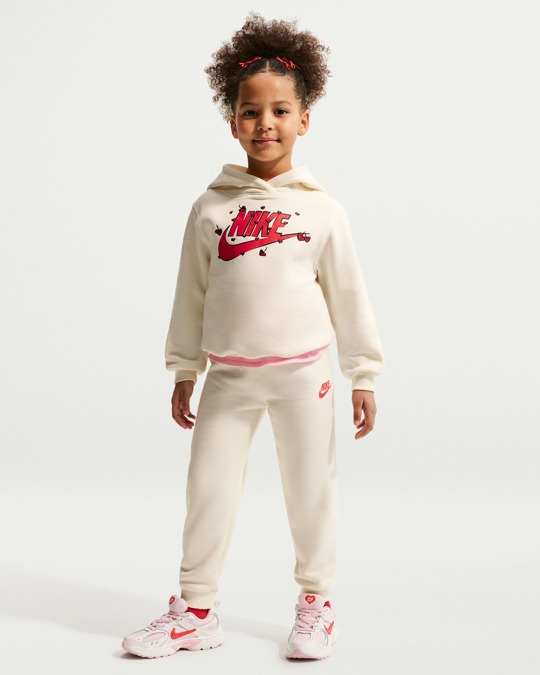 Conjunto de sudadera con gorro sin cierre y joggers de tejido Fleece para niños talla pequeña Nike - Marrón