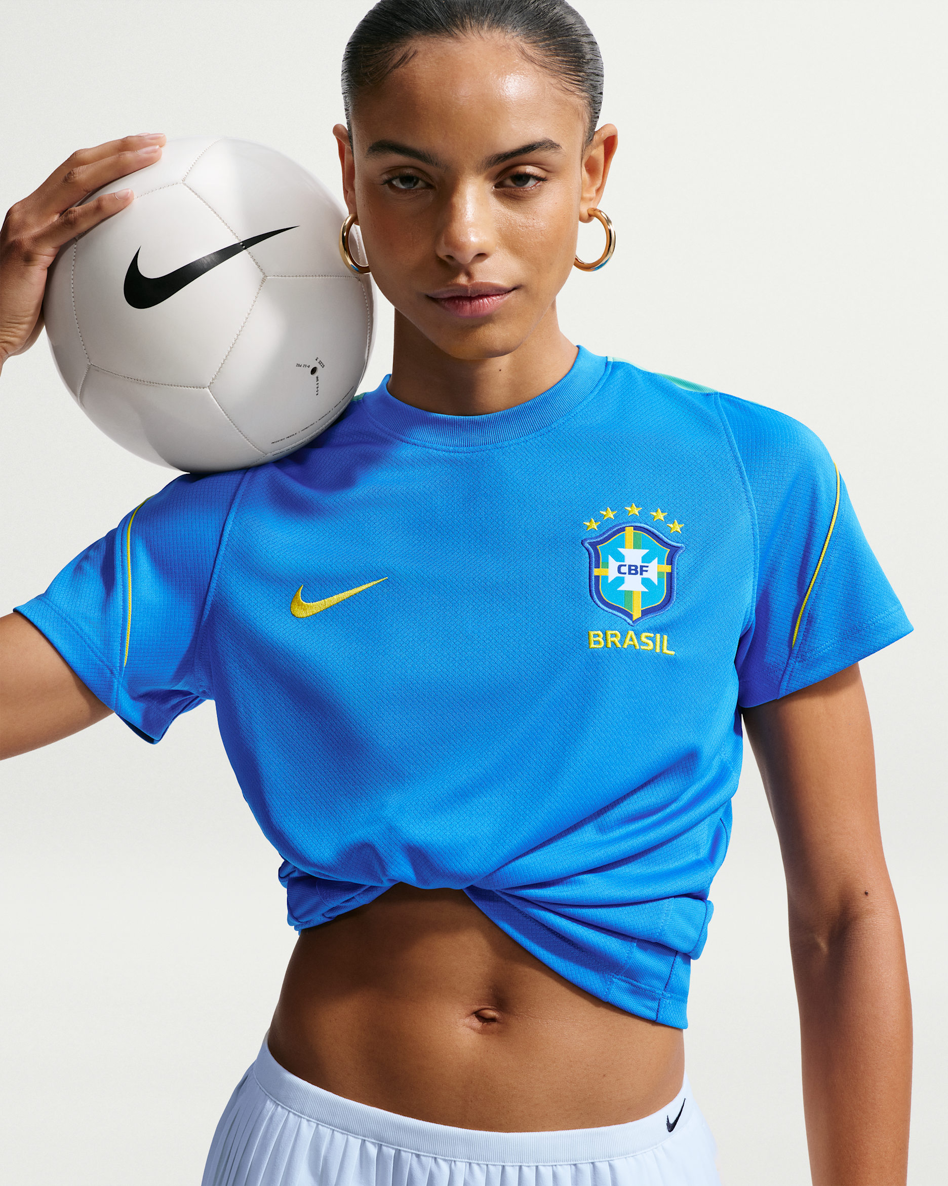 Brazil Strike Women's Nike Soccer Dri-FIT Short-Sleeve Top - Light Photo Blue/Light Menta/Midwest Gold