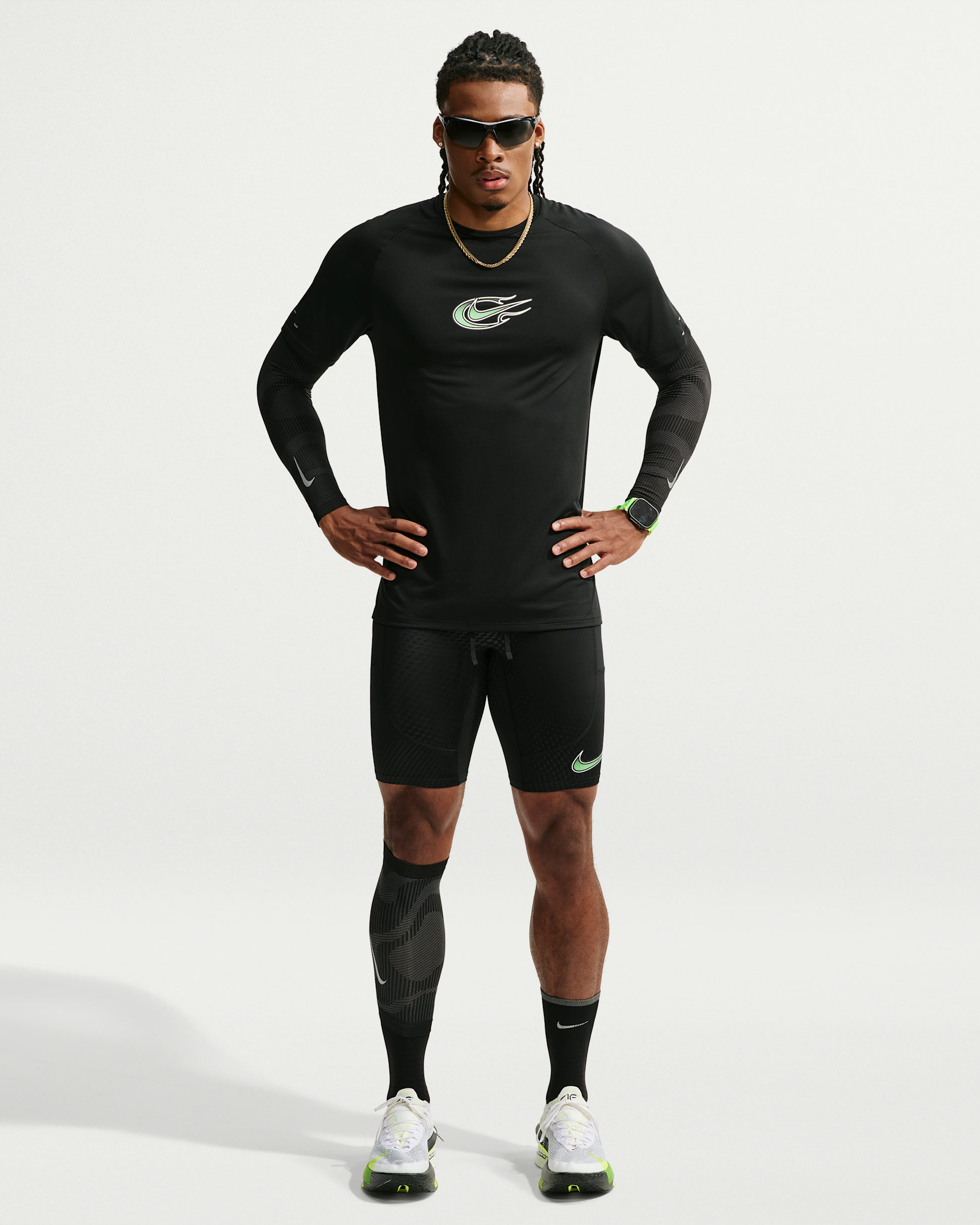 Legging de running demi-longueur Dri-FIT Nike Stride pour homme - Noir/Illusion Green/Blanc