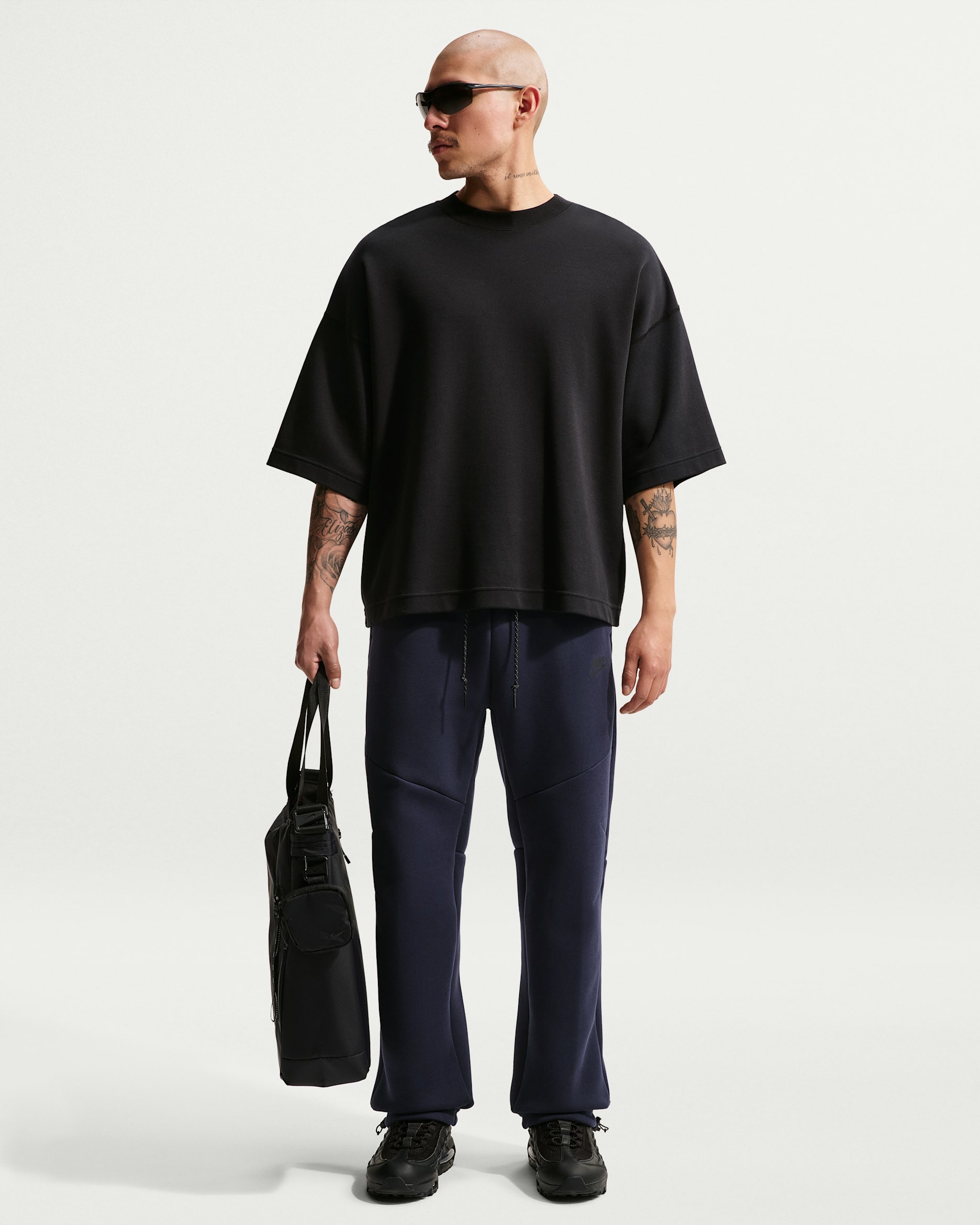 Pantalon à ourlet ouvert en Fleece Nike Tech pour homme - Obsidian/Noir