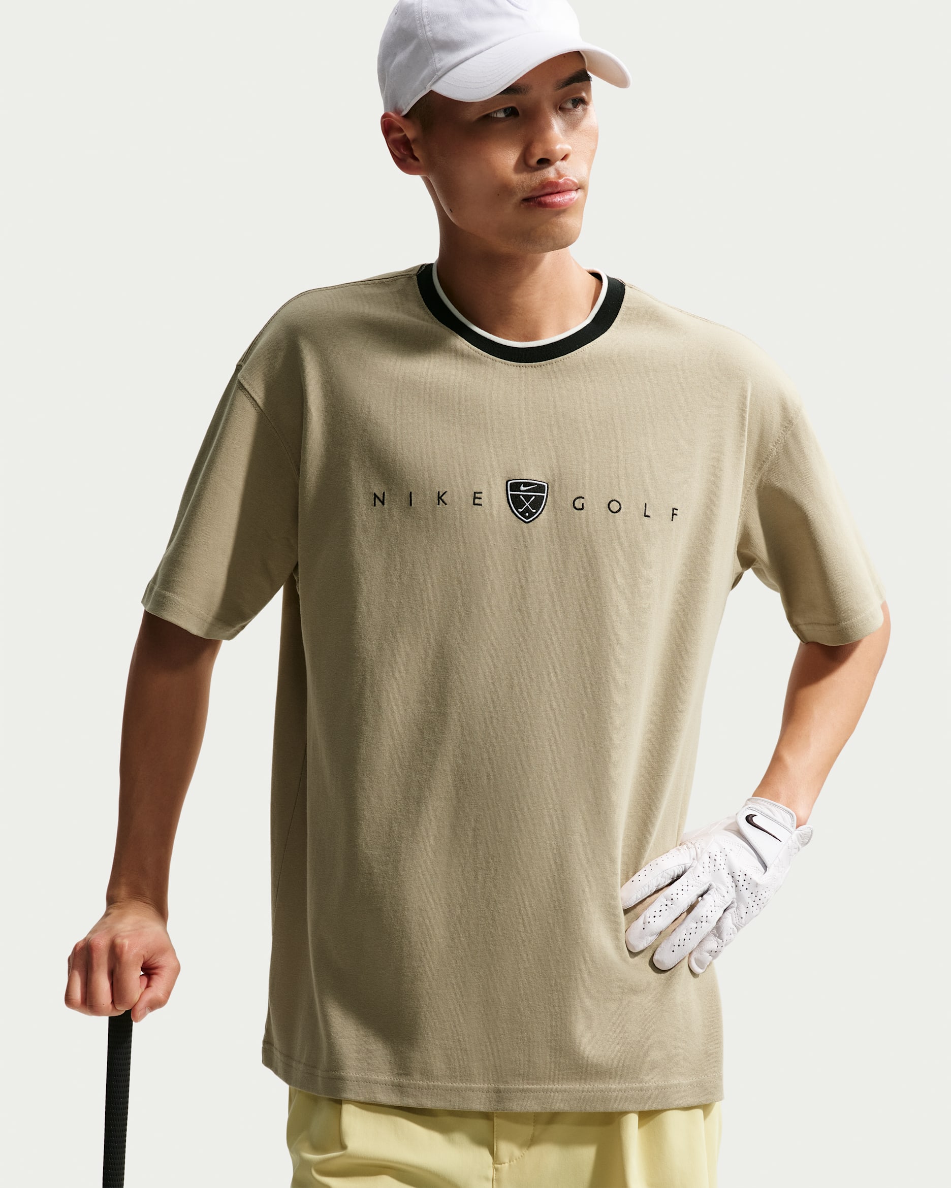 Playera de golf de corte holgado para hombre Nike - Caliza