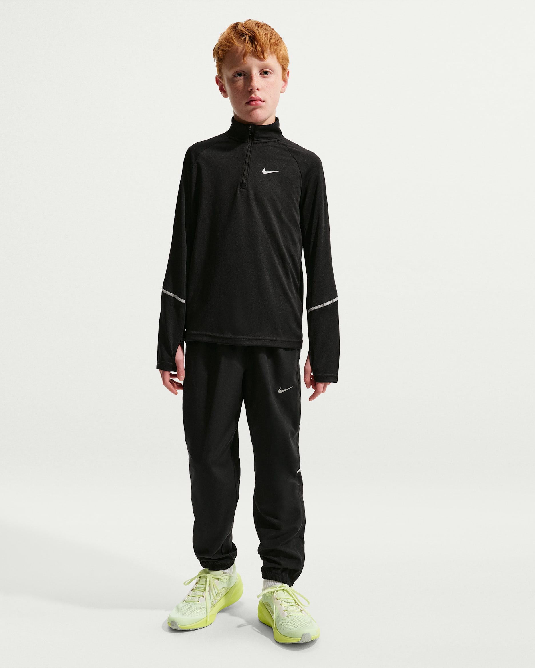 Nike Miler Older Kids' Dri-FIT Woven Trousers - Black