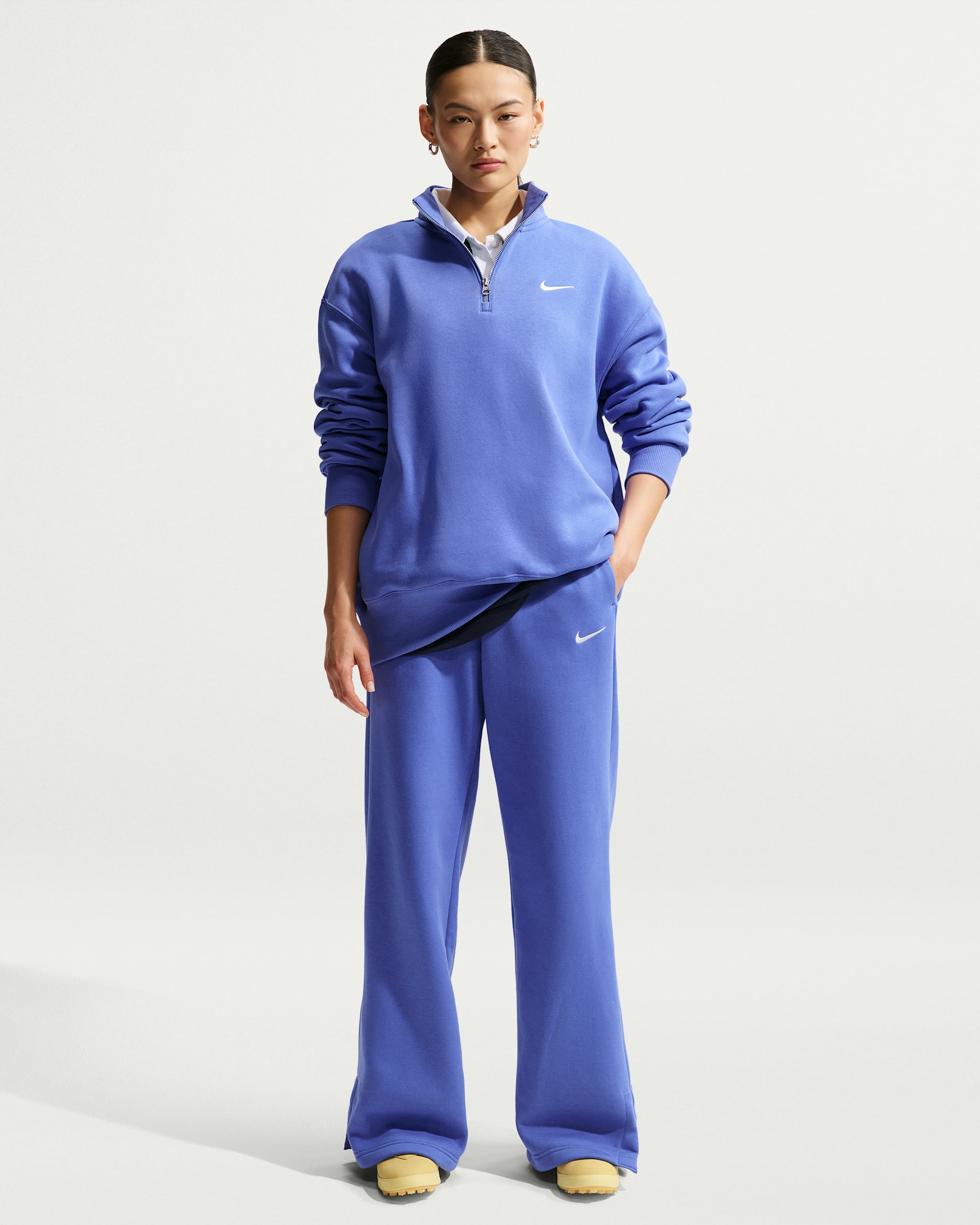 Pants de tiro alto de pierna amplia para mujer Nike Sportswear Phoenix Fleece - Azul medio claro/Vela