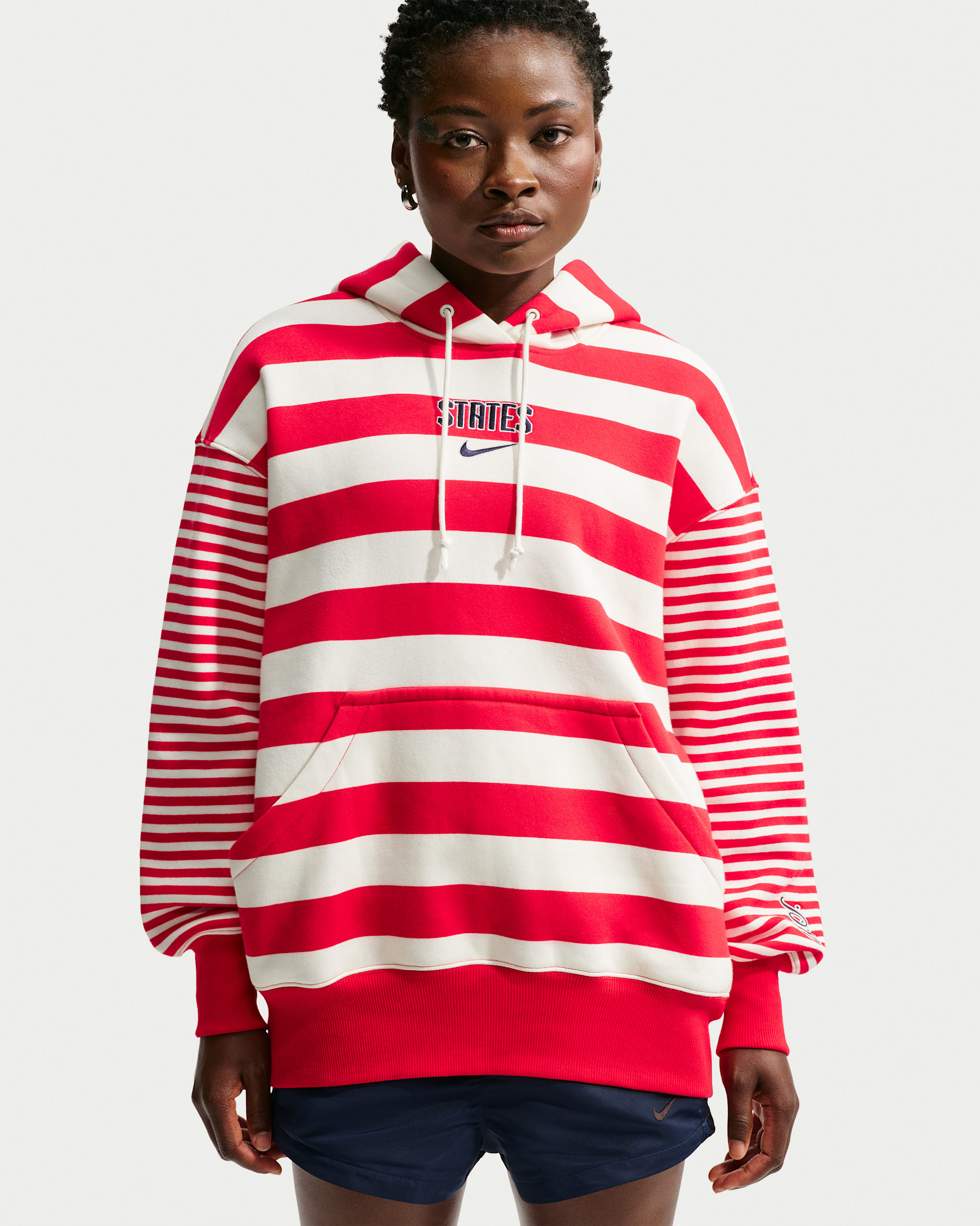 Sudadera con gorro con cierre para fútbol oversized Nike para mujer de la selección nacional de fútbol masculino de Estados Unidos Phoenix Fleece - Vela/Rojo universitario/Azul marino medianoche/Vela