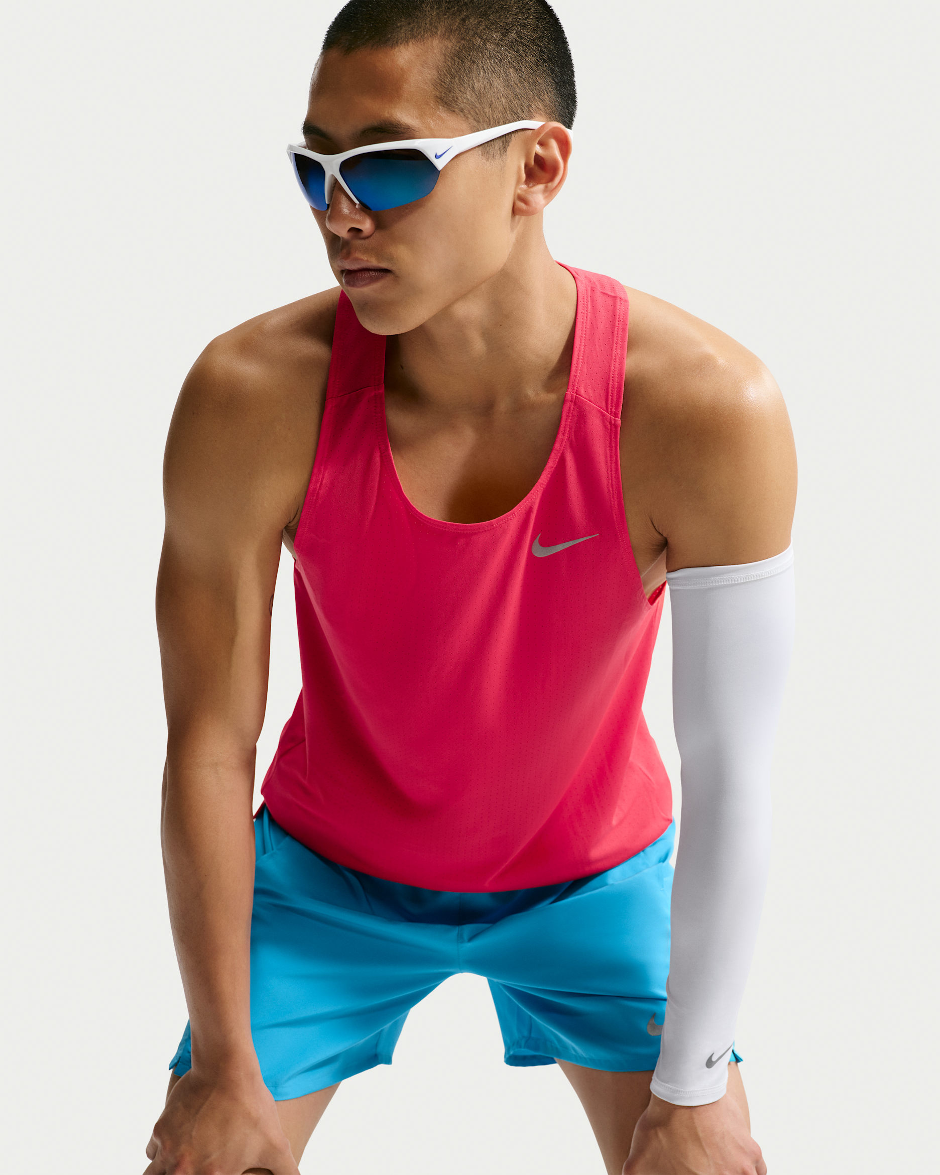 Pánské běžecké tílko Dri-FIT Nike Fast - Fusion Red