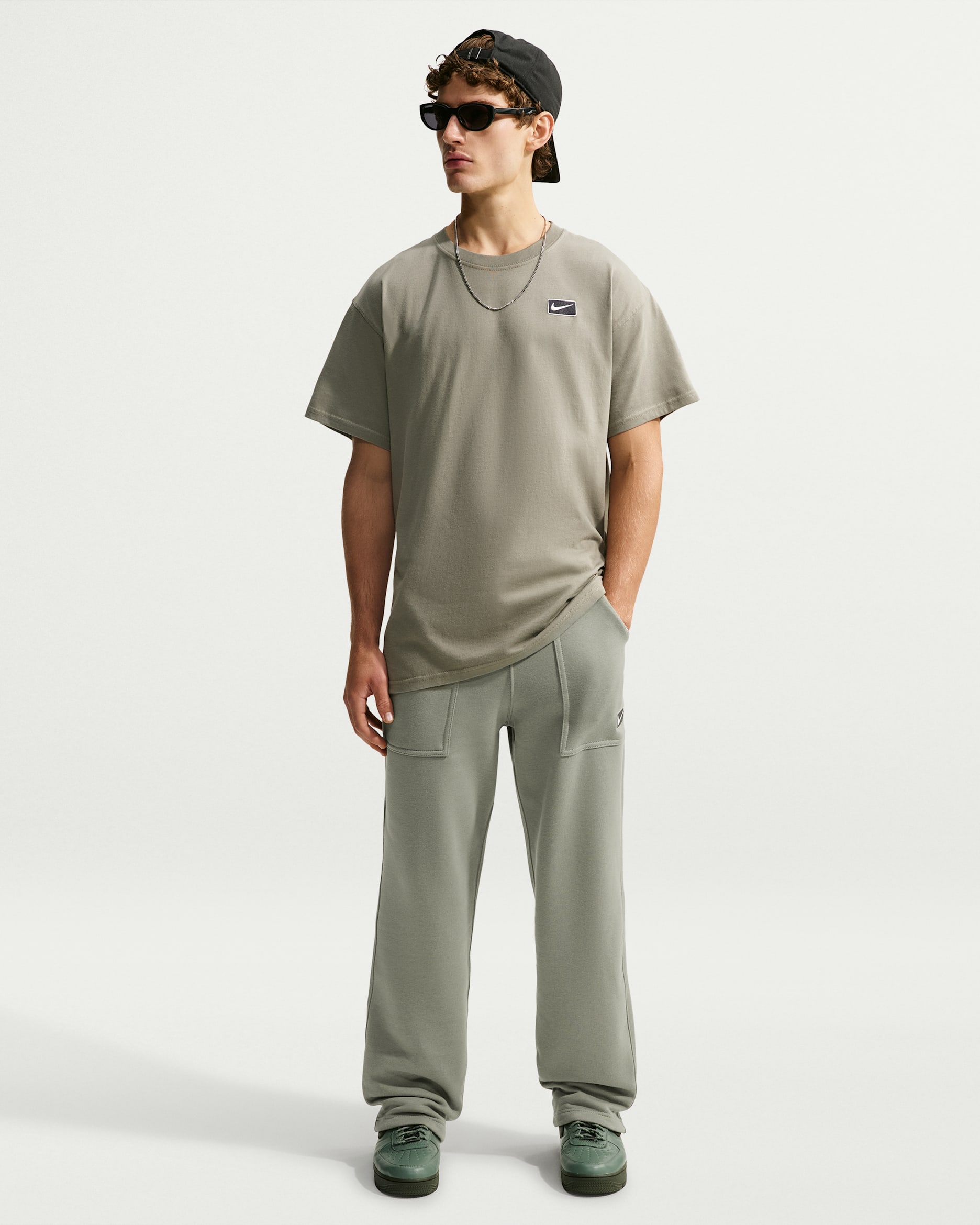 Nike Sportswear fleece herenbroek met open zoom - Dark Stucco