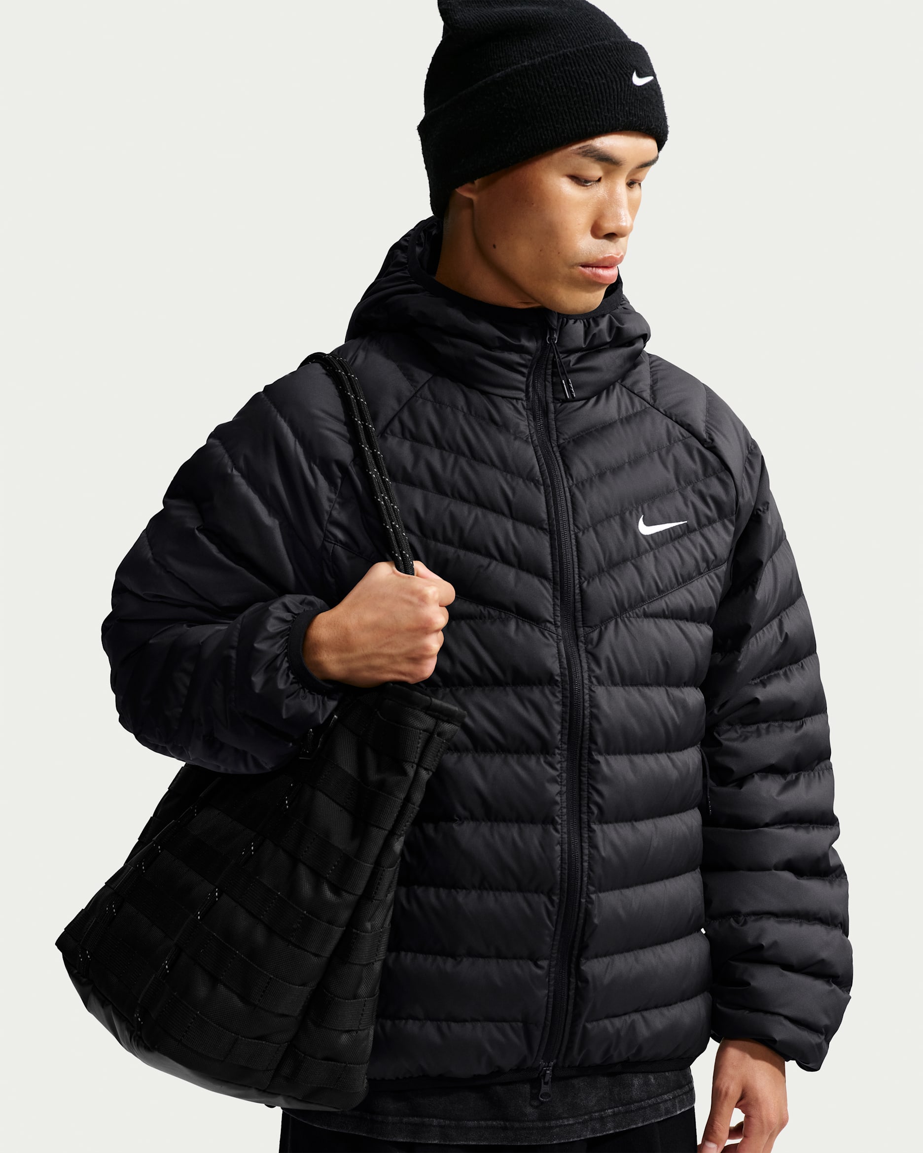 Giacca in piumino leggero Microchannel Nike Windrunner – Uomo - Nero/Bianco