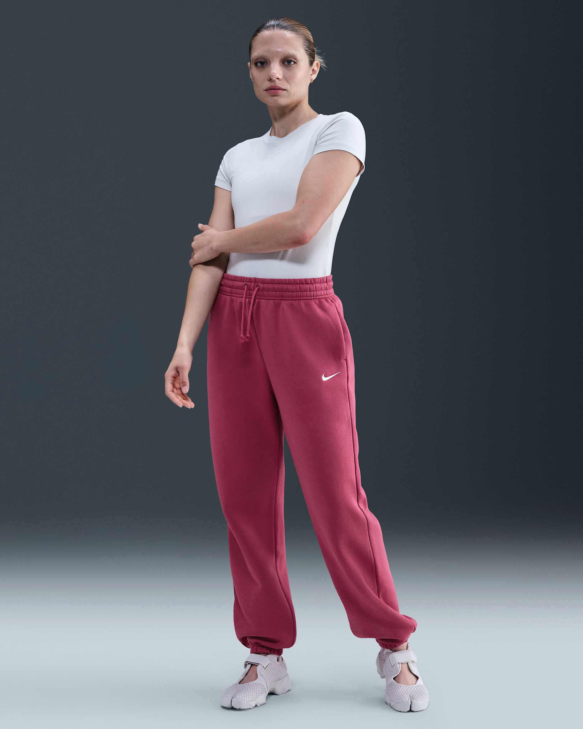 Pants de entrenamiento oversized de tiro alto para mujer Nike Sportswear Phoenix Fleece - Remolacha dulce/Vela