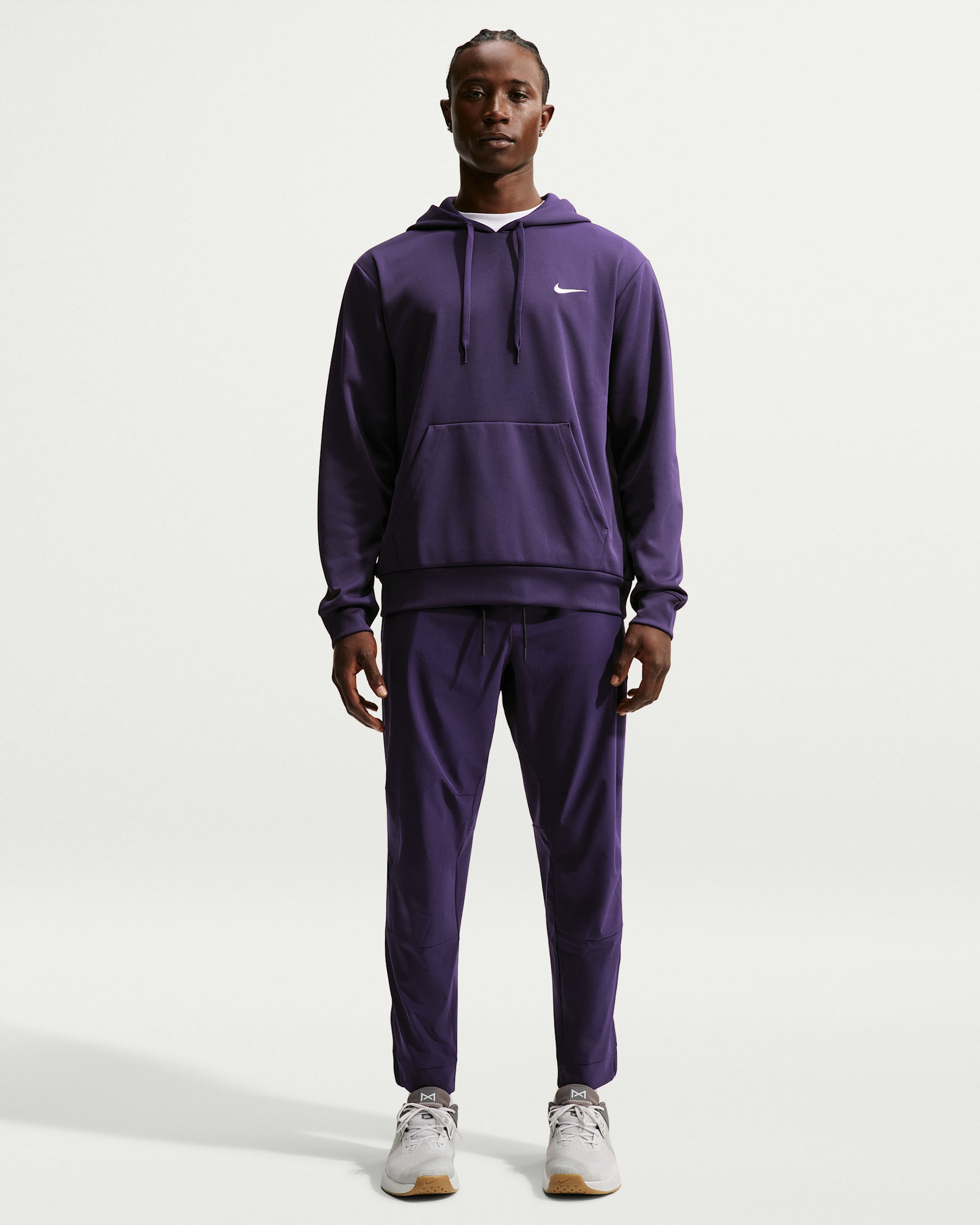 Ανδρικό ευέλικτο παντελόνι Dri-FIT με φερμουάρ στα ρεβέρ Nike Unlimited - Purple Dynasty/Μαύρο/Purple Dynasty