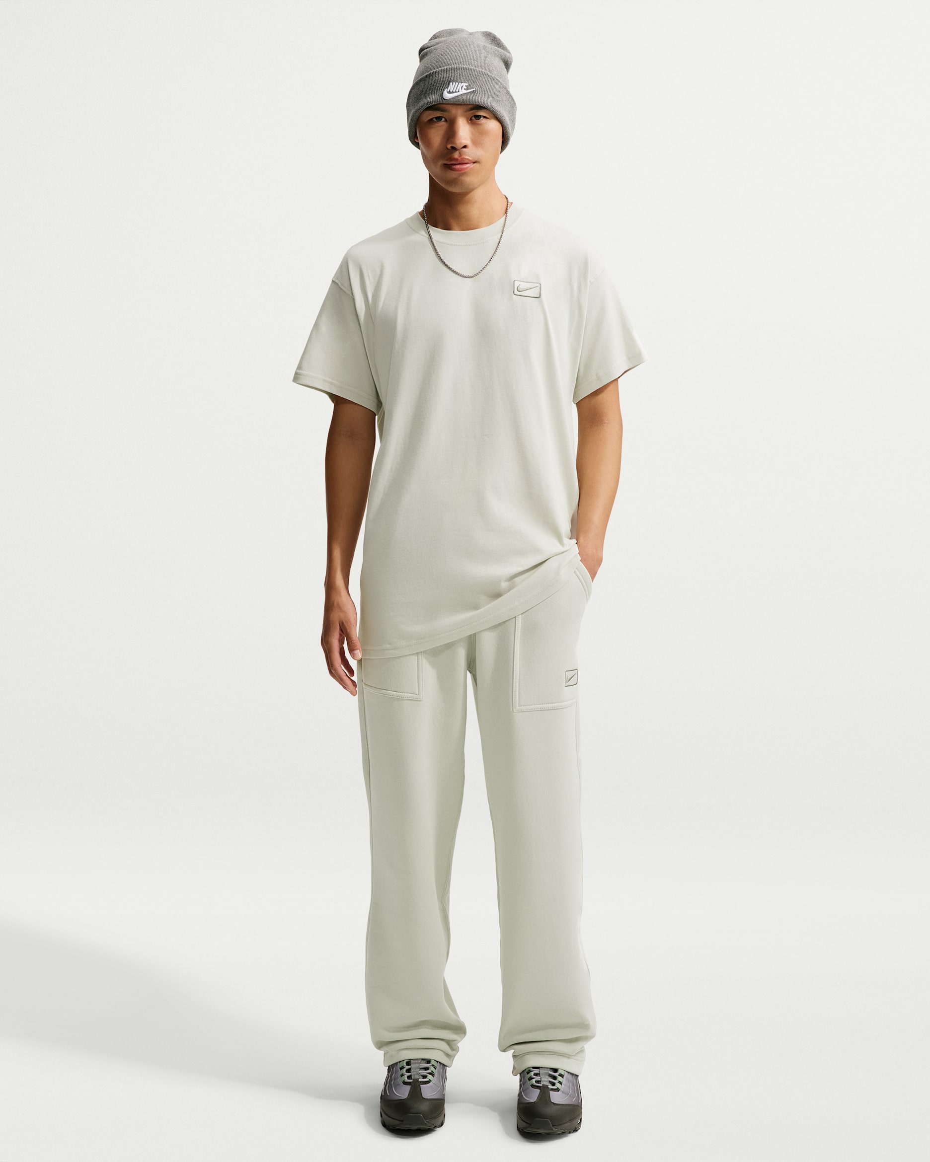 Fleecebyxor med vid fåll Nike Sportswear för män - Light Bone