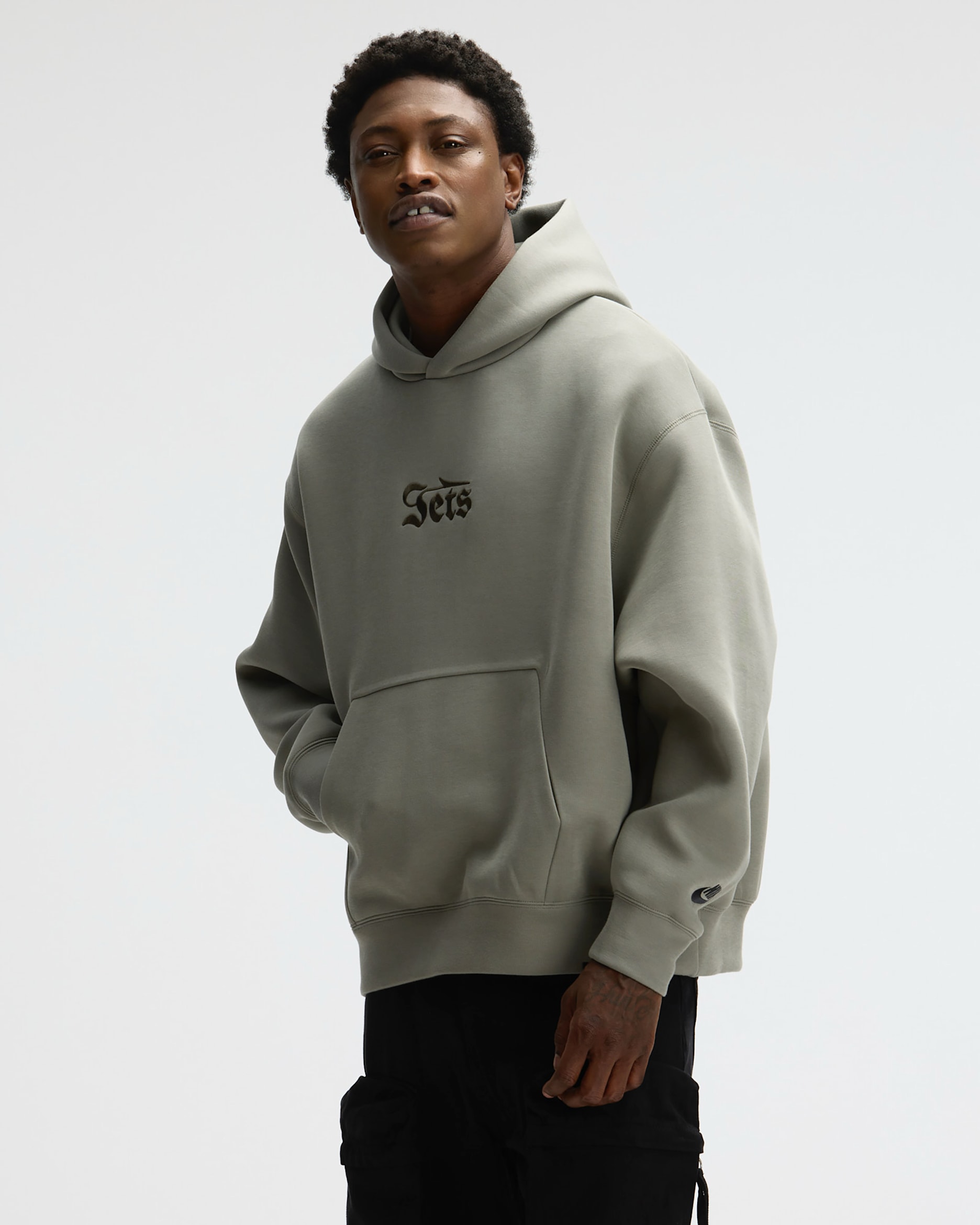 Sudadera con gorro sin cierre Nike de la NFL para hombre New York Jets Rivalries Collection Oversized Tech Fleece - Carbón