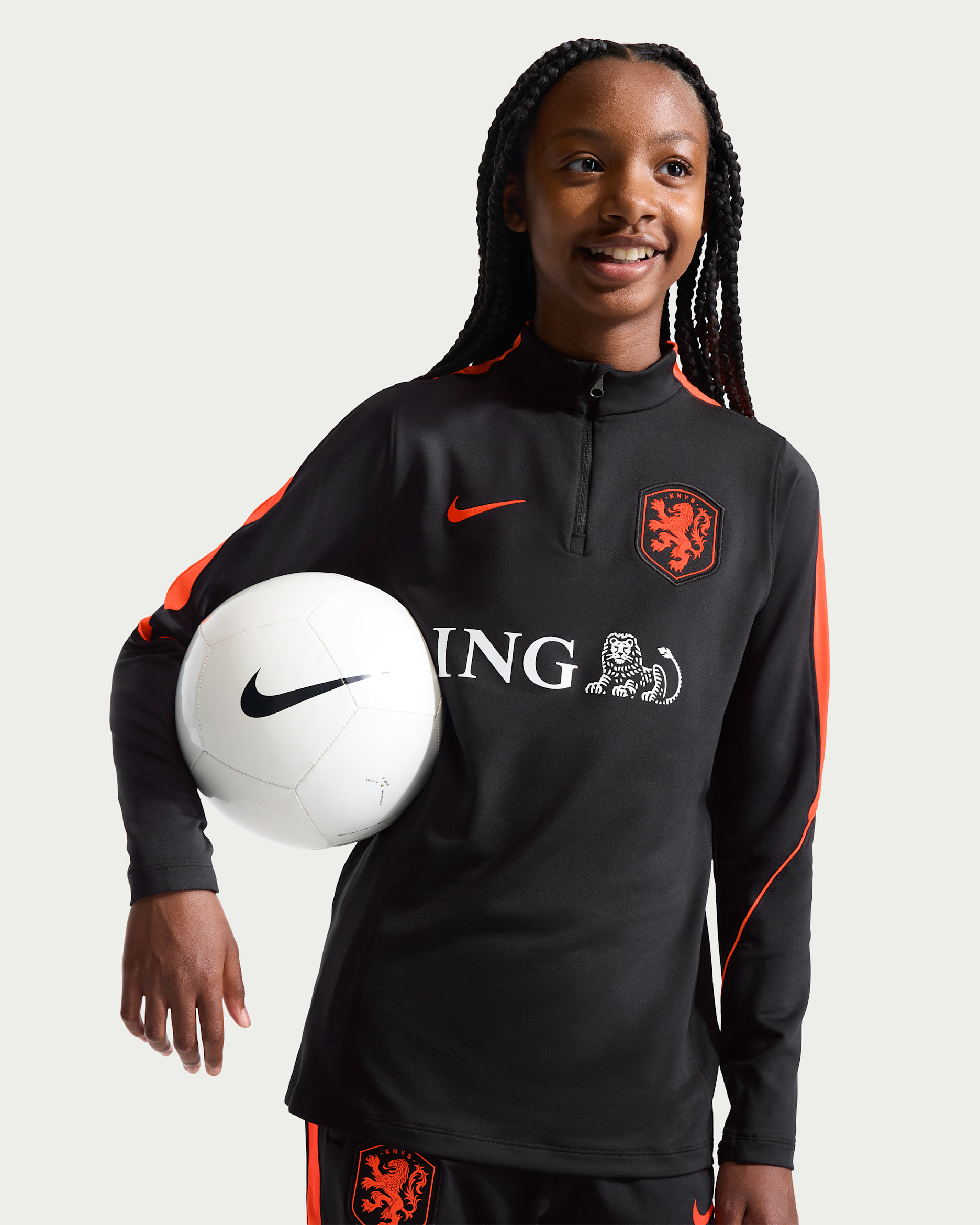 Netherlands Strike Older Kids' Nike Dri-FIT Football Drill Top - Black/Hyper Crimson/Hyper Crimson