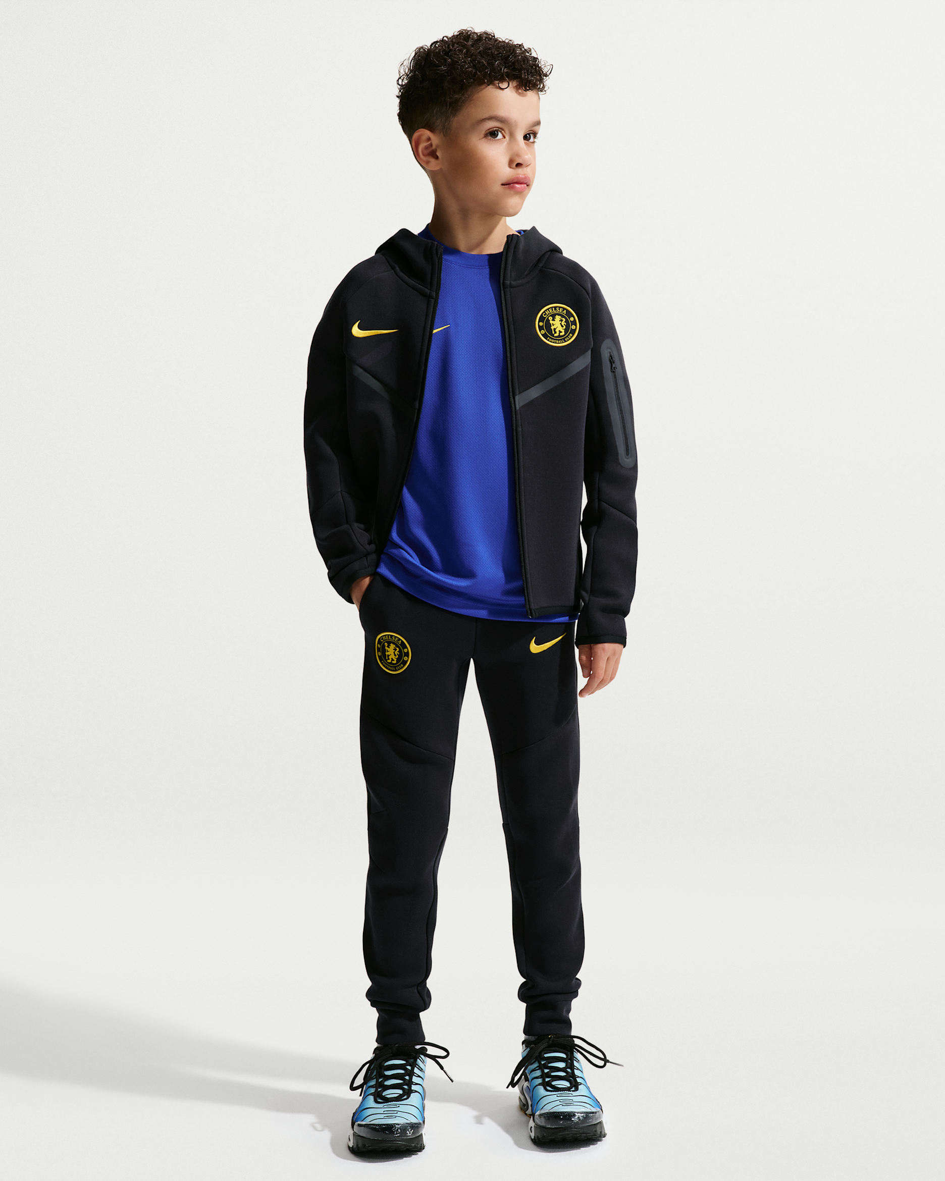 Chelsea F.C. Tech Fleece Older Kids' (Boys') Nike Football Trousers - Pitch Blue/Midwest Gold