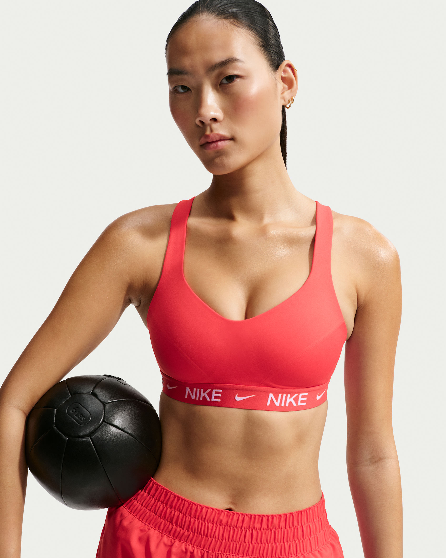 Nike Indy High Support Women's Padded Adjustable Sports Bra - Light Crimson