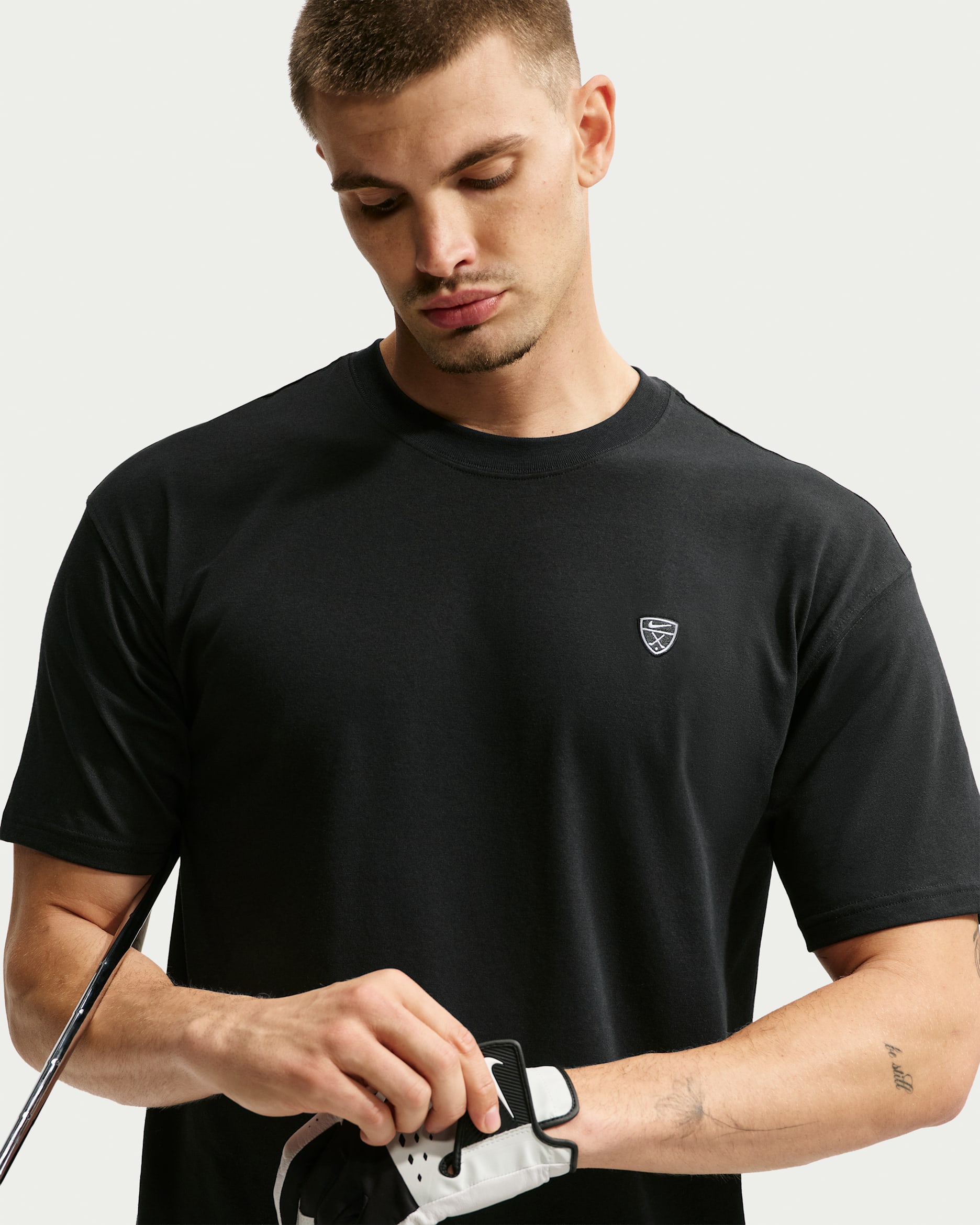 Golf-t-shirt Nike Dri-FIT lös passform för män - Svart