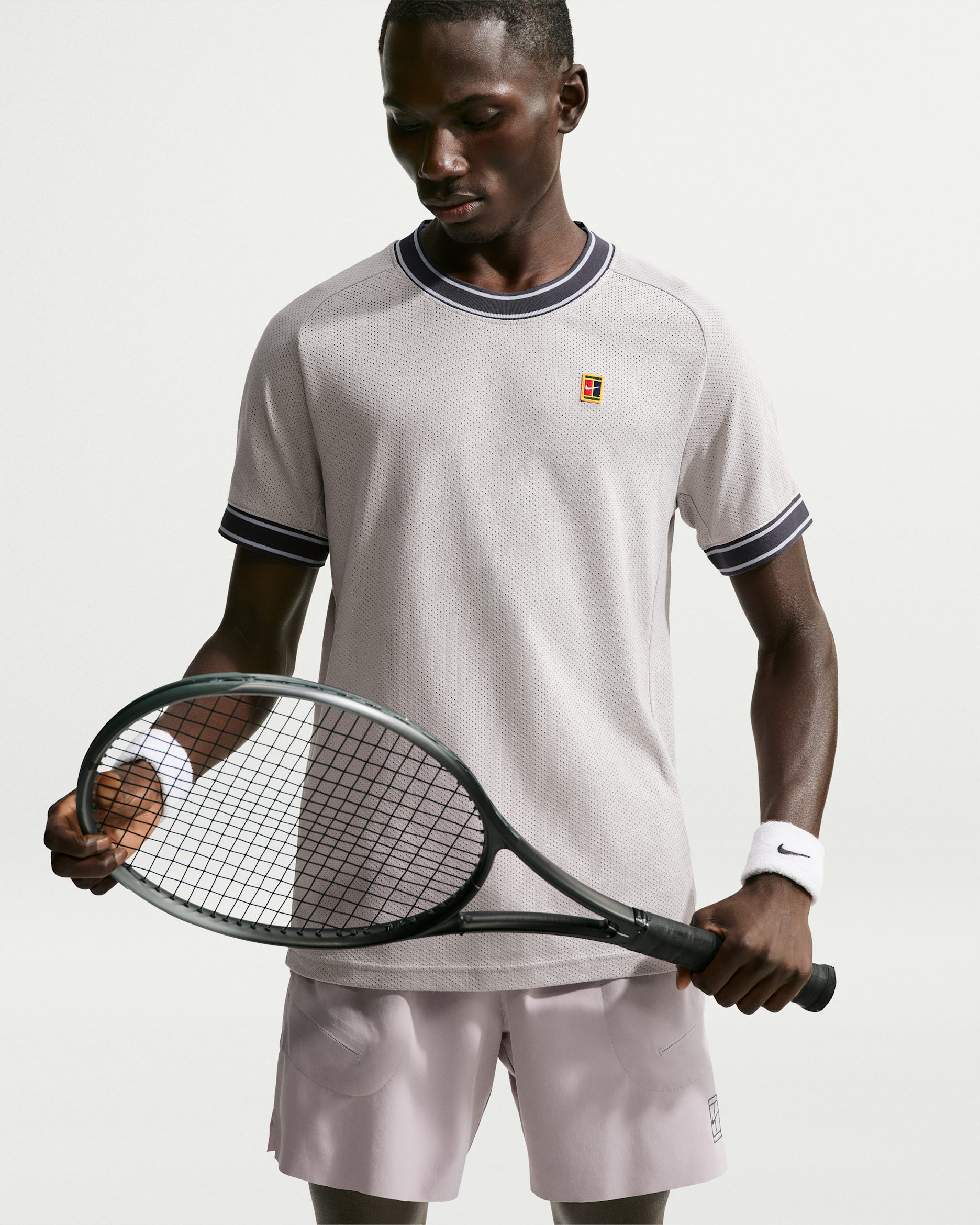 Playera de tenis de manga corta para hombre NikeCourt Heritage - Lila plata/Parrilla