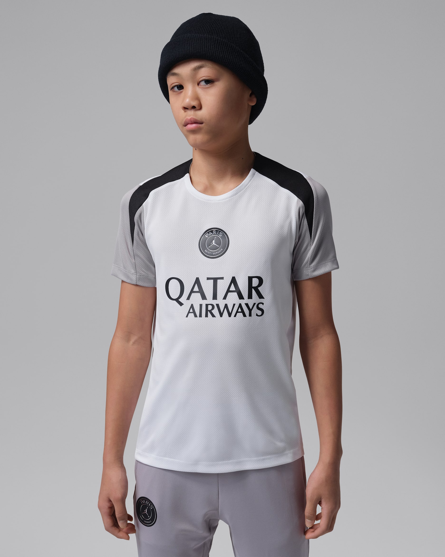 Paris Saint-Germain Strike Night Edition Older Kids' Jordan Dri-FIT Football Short-Sleeve Knit Top - White/Atmosphere Grey/Black/Black