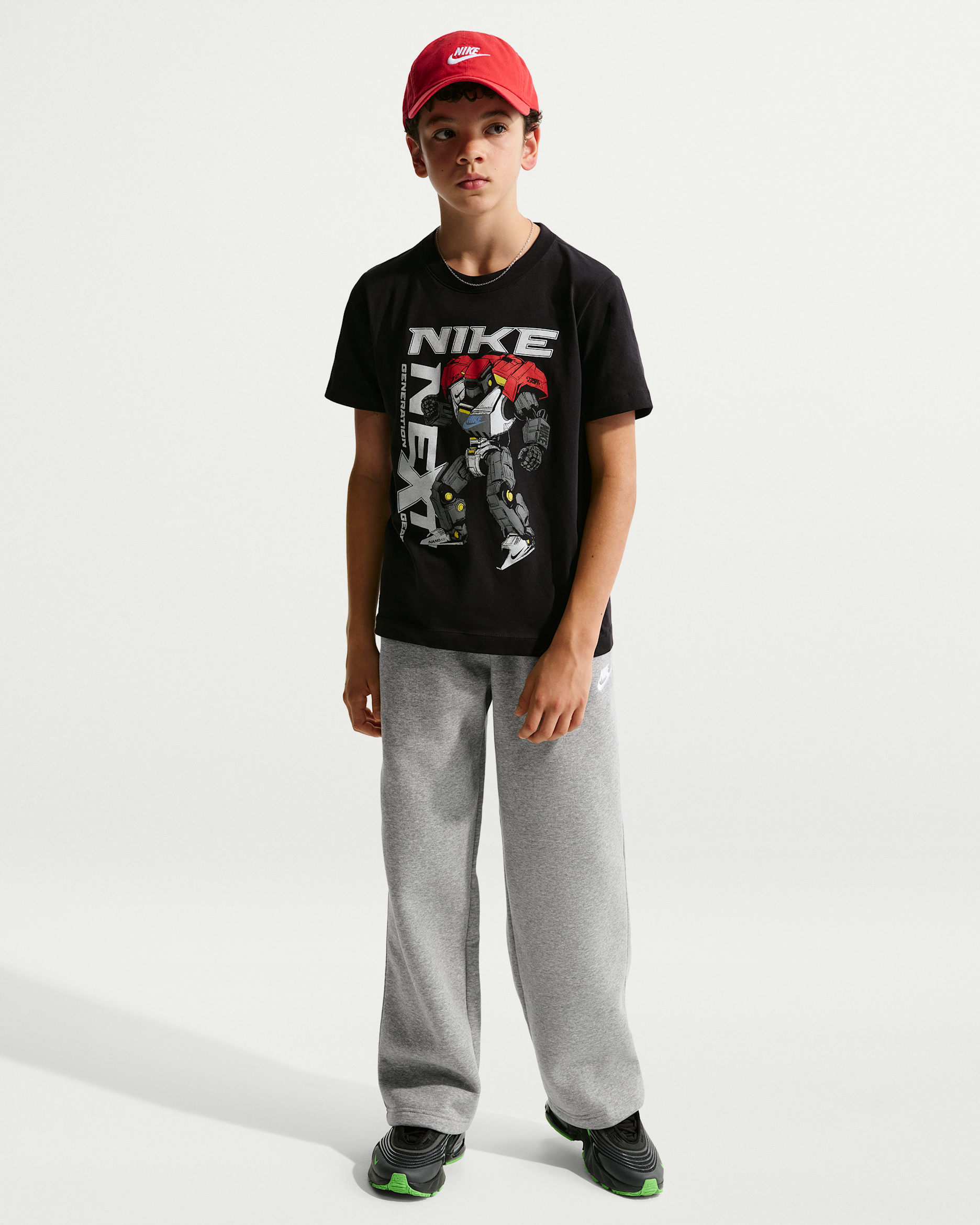 Pants holgados con dobladillo abierto para niños Nike Sportswear - Gris oscuro jaspeado/Blanco