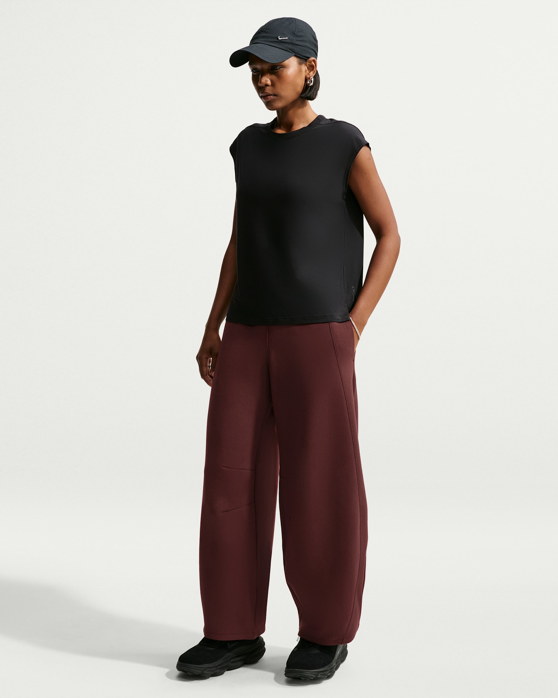Pantaloni a gamba larga e vita alta Nike 24.7 ImpossiblySoft – Donna - Mystic Dates/Nero/Light Boulder