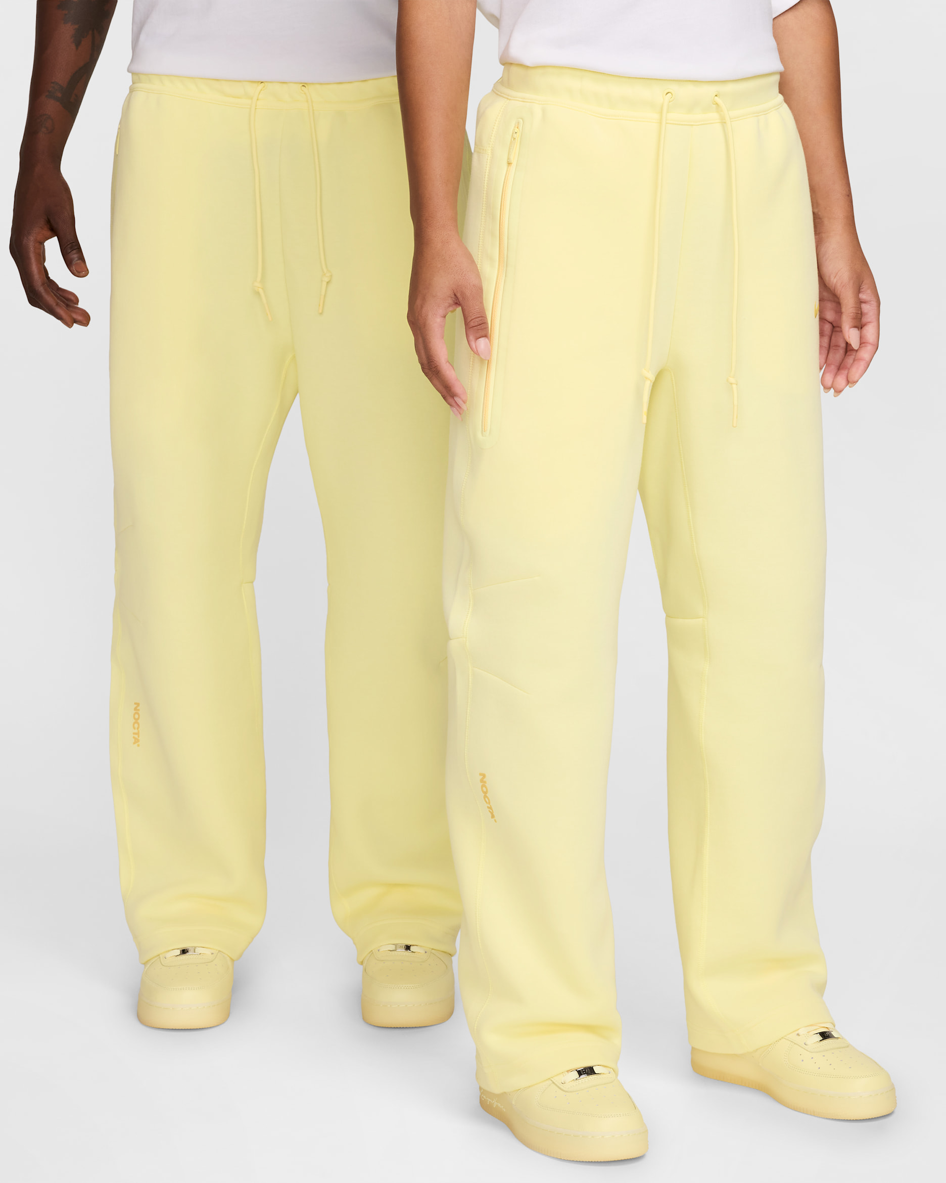 NOCTA テック フリース メンズ オープンヘム スウェットパンツ - シトロンティント/ビビッドサルファー