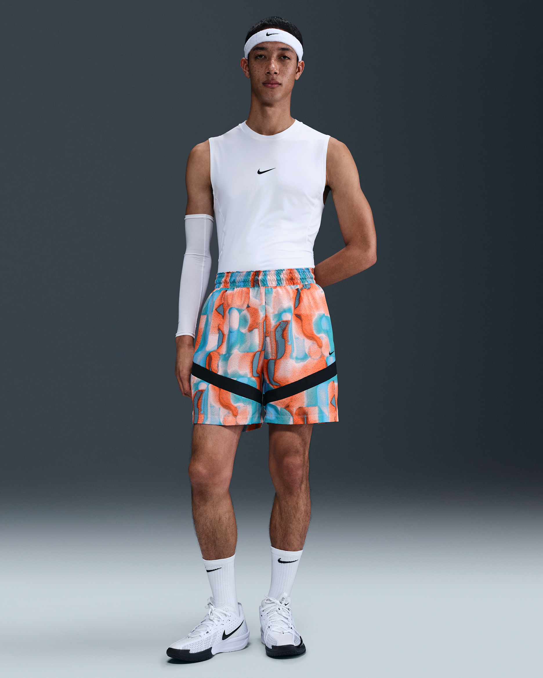 Shorts de básquetbol Dri-FIT de 15 cm para hombre Nike Icon - Coral lavado/Azul universitario/Negro/Negro