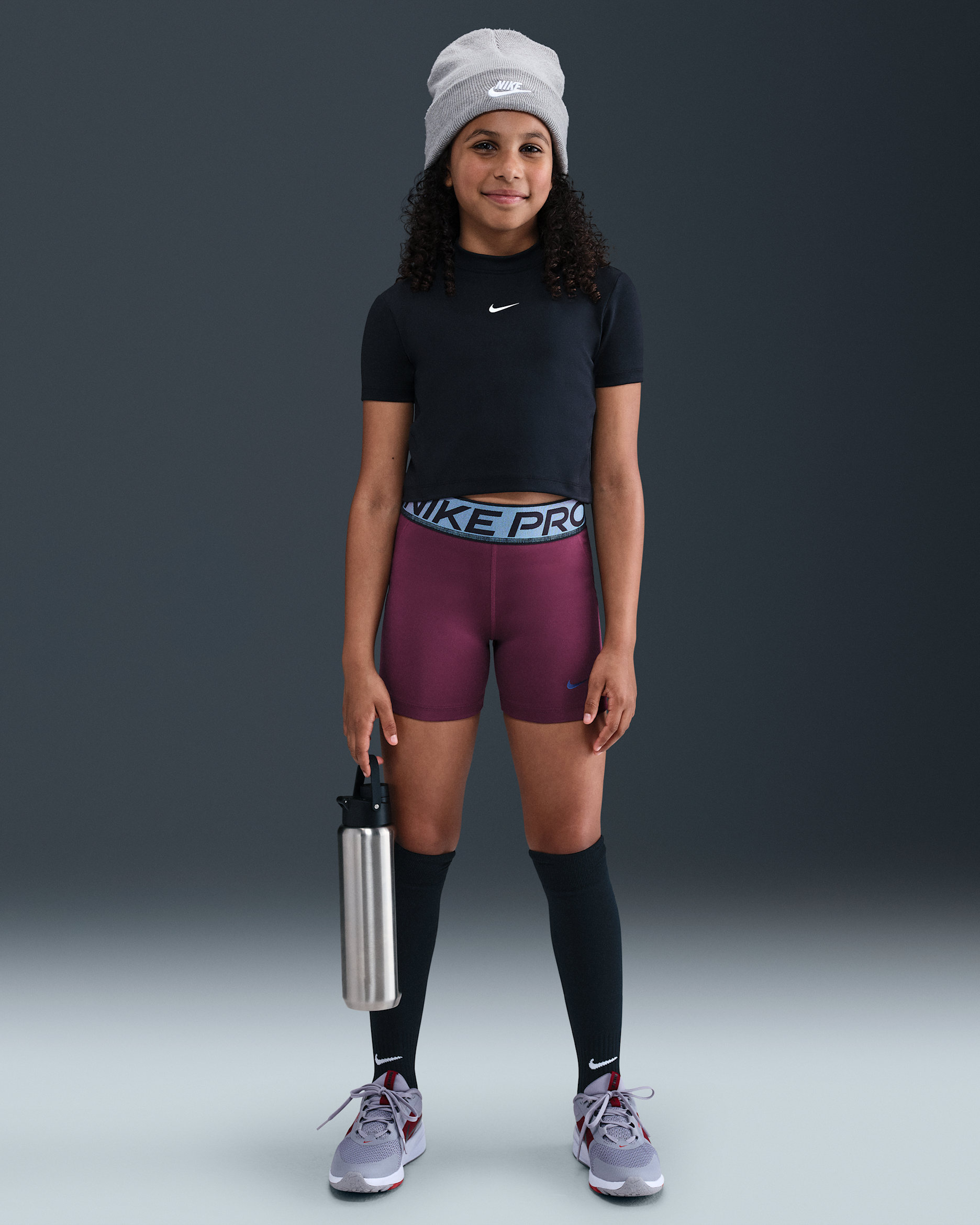 Nike Pro Older Kids' (Girls') Dri-FIT 7.5cm (approx.) Shorts with Shine Accents - Bordeaux