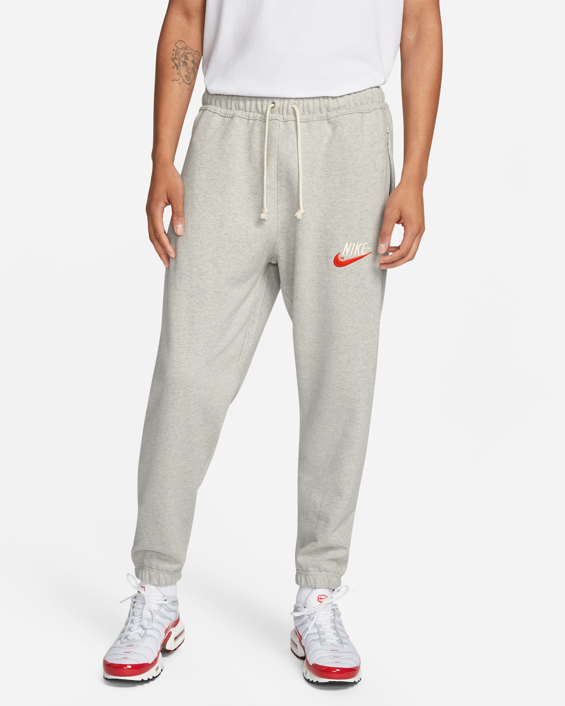 Pantalones sneaker para hombre Nike Sportswear - Gris jaspeado/Sombrío apagado/Vela/Naranja team