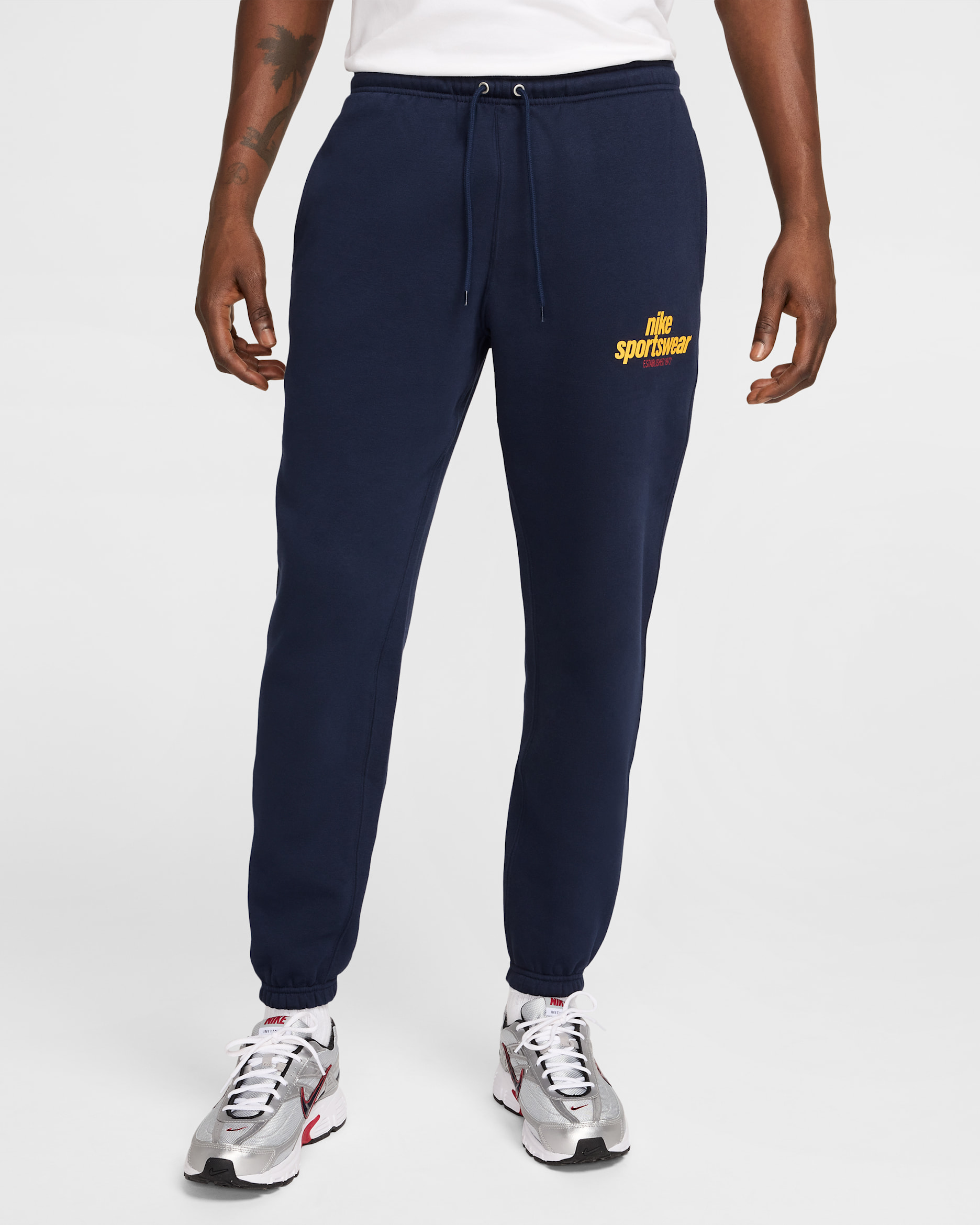 Pants de tejido Fleece para hombre Nike Club - Obsidiana/Obsidiana/Oro universitario