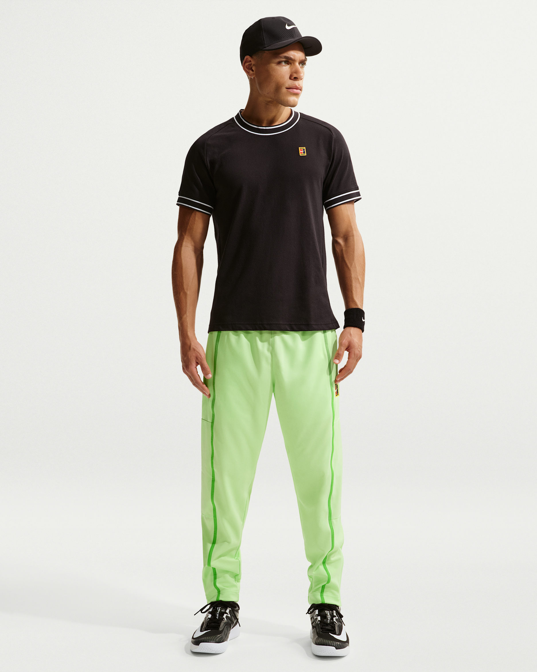 Pantalon de tennis NikeCourt Heritage pour homme - Light Liquid Lime/Mean Green