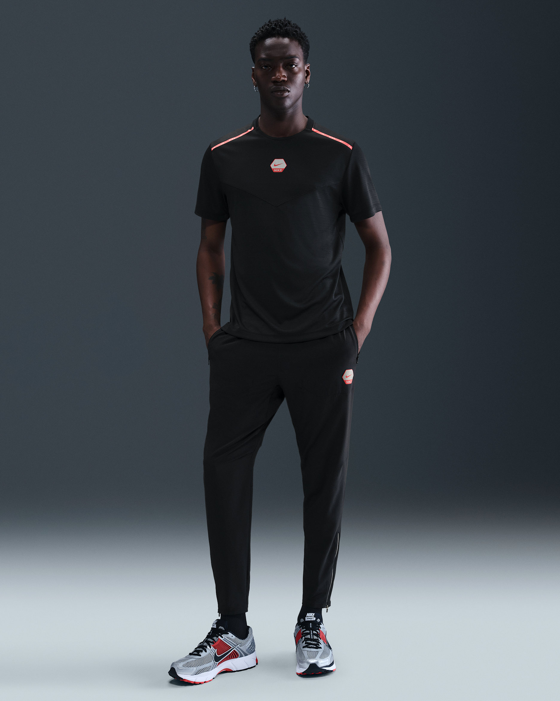 Nike Sportswear City Side løpebukser til herre - Svart/Light Crimson