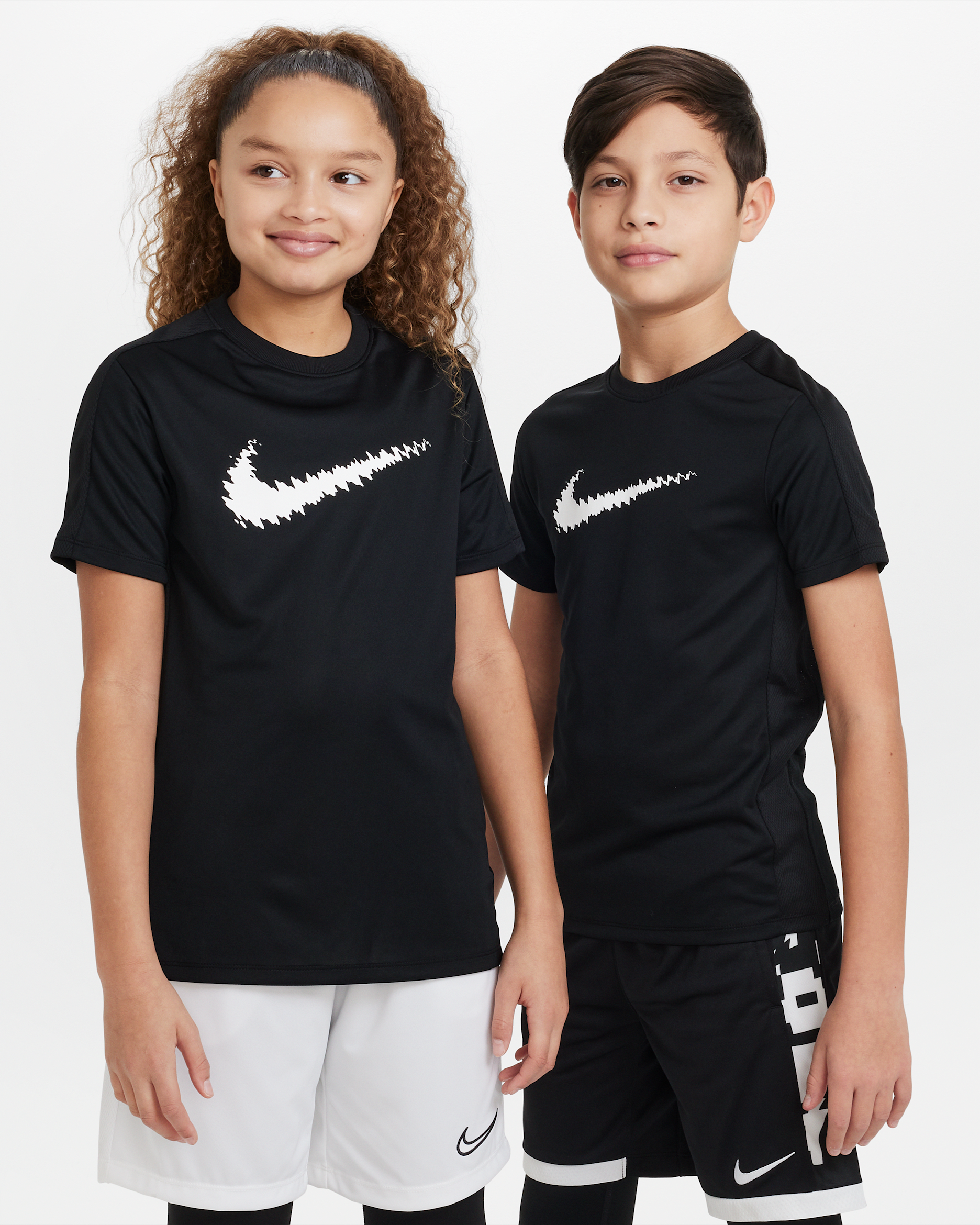 Nike Dri-FIT Trophy Older Kids' Graphic Short-Sleeve Training Top - Black/White