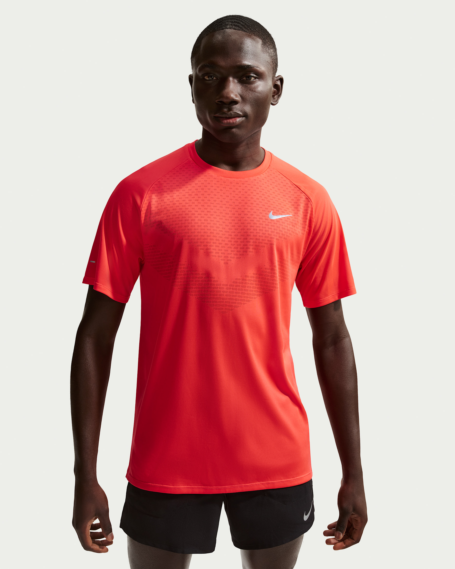 Kortärmad löpartröja Nike Stride Dri-FIT ADV för män - Light Crimson
