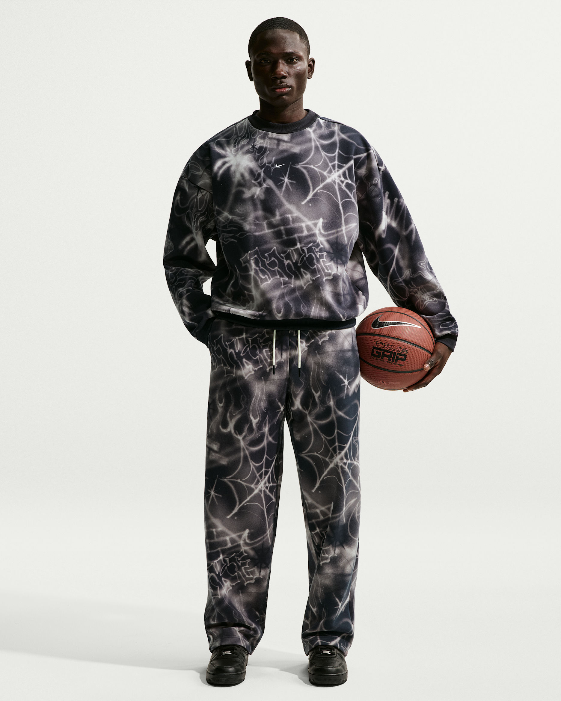 Nike Standard Issue-basketballbukser med åbne manchetter til mænd - sort/Pale Ivory